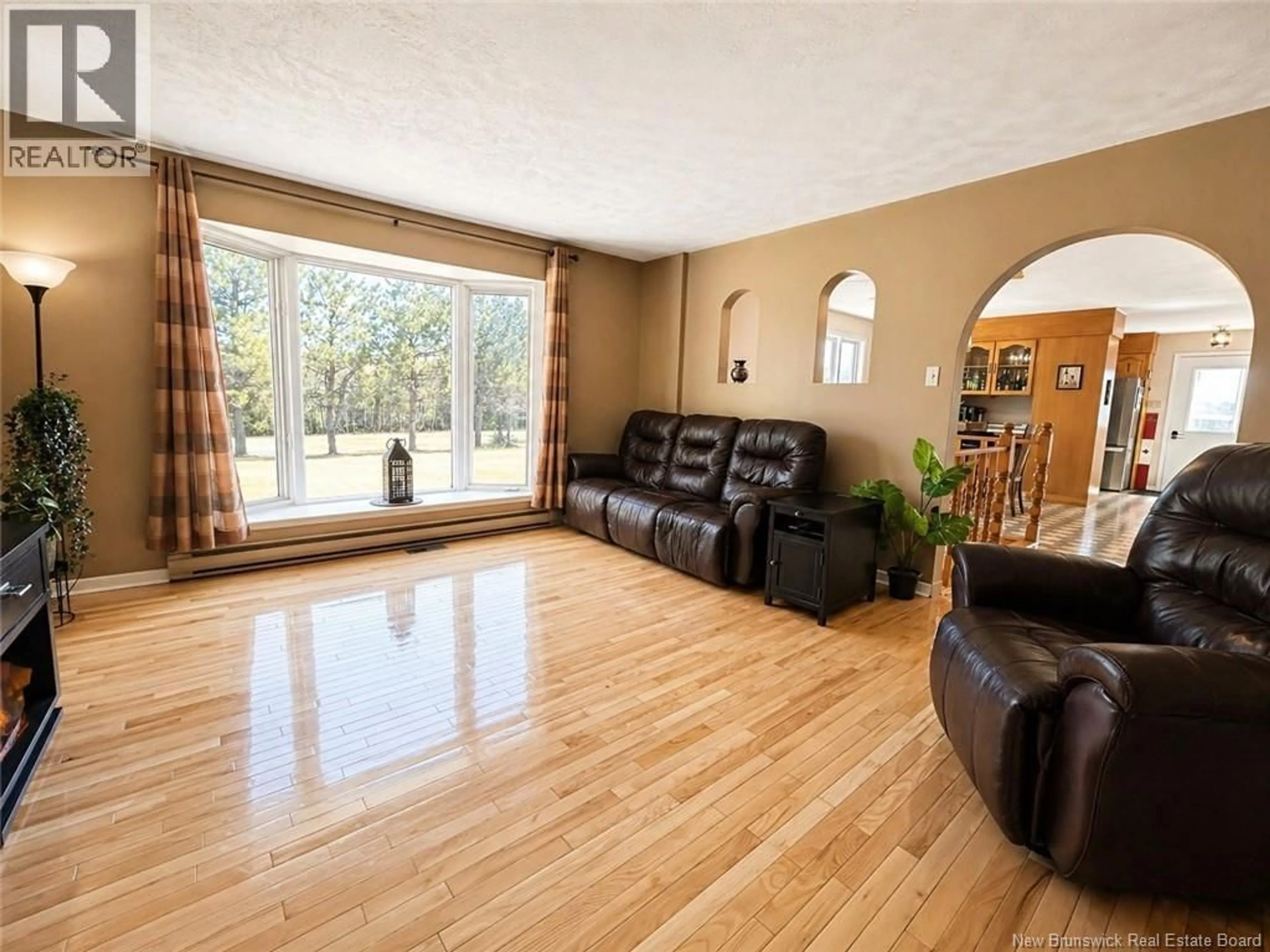 Living room with furniture, wood/laminate floor for 5416 ROUTE 440, Rosaireville New Brunswick E4Y2R6