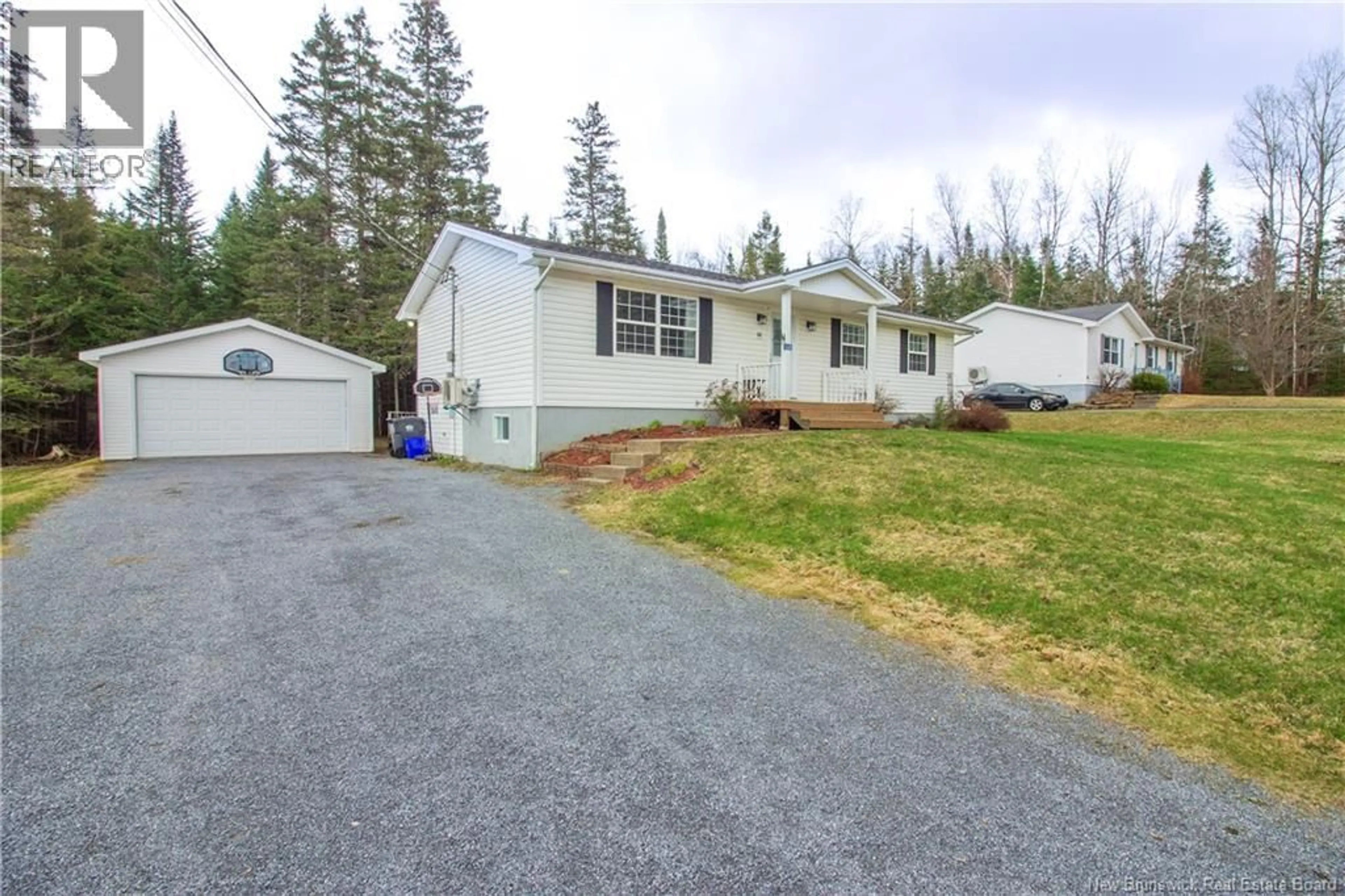 Home with vinyl exterior material, street for 68 DONLEA DRIVE, Hampton New Brunswick E5N5K3