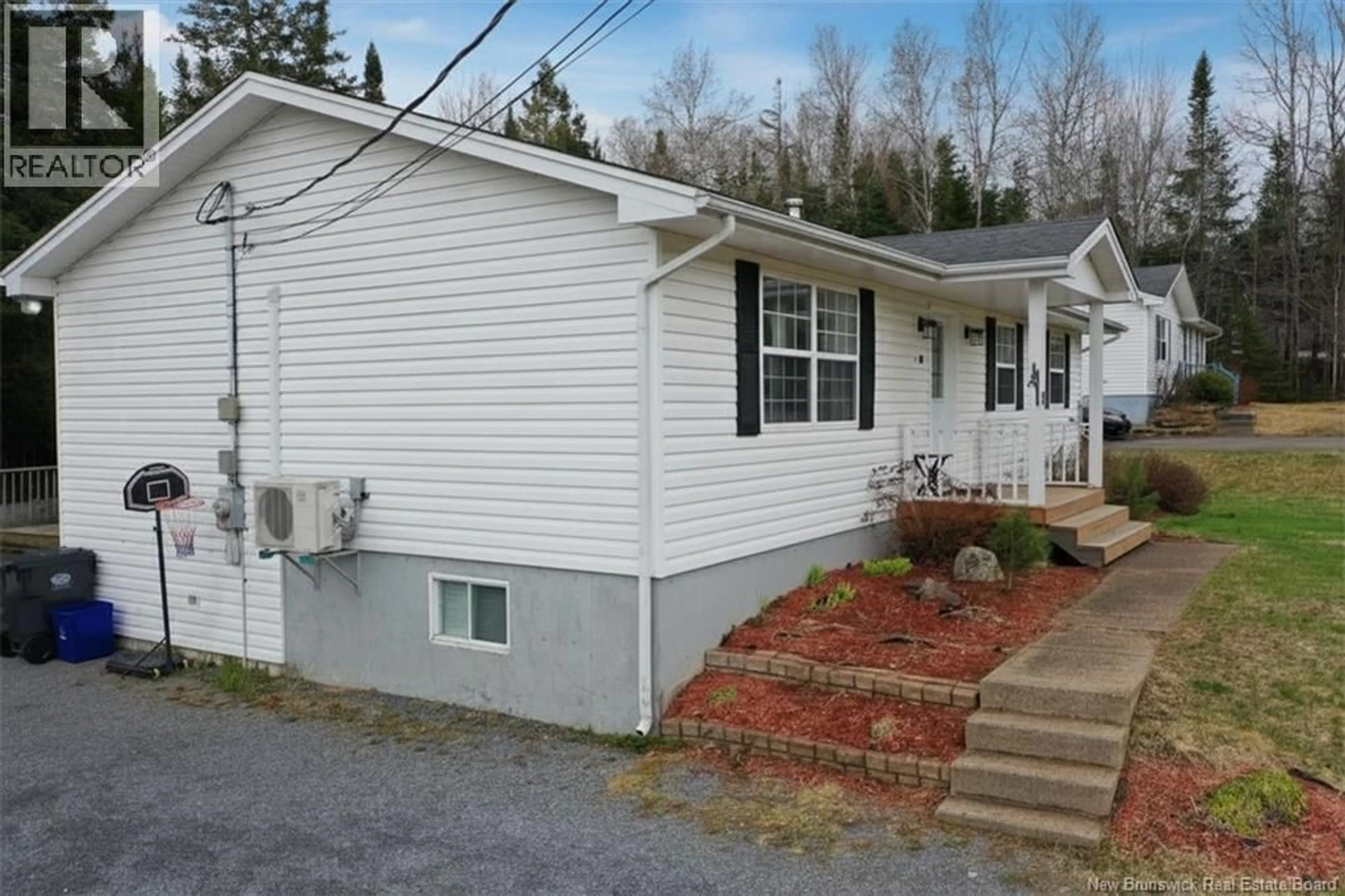 Home with vinyl exterior material, street for 68 DONLEA DRIVE, Hampton New Brunswick E5N5K3