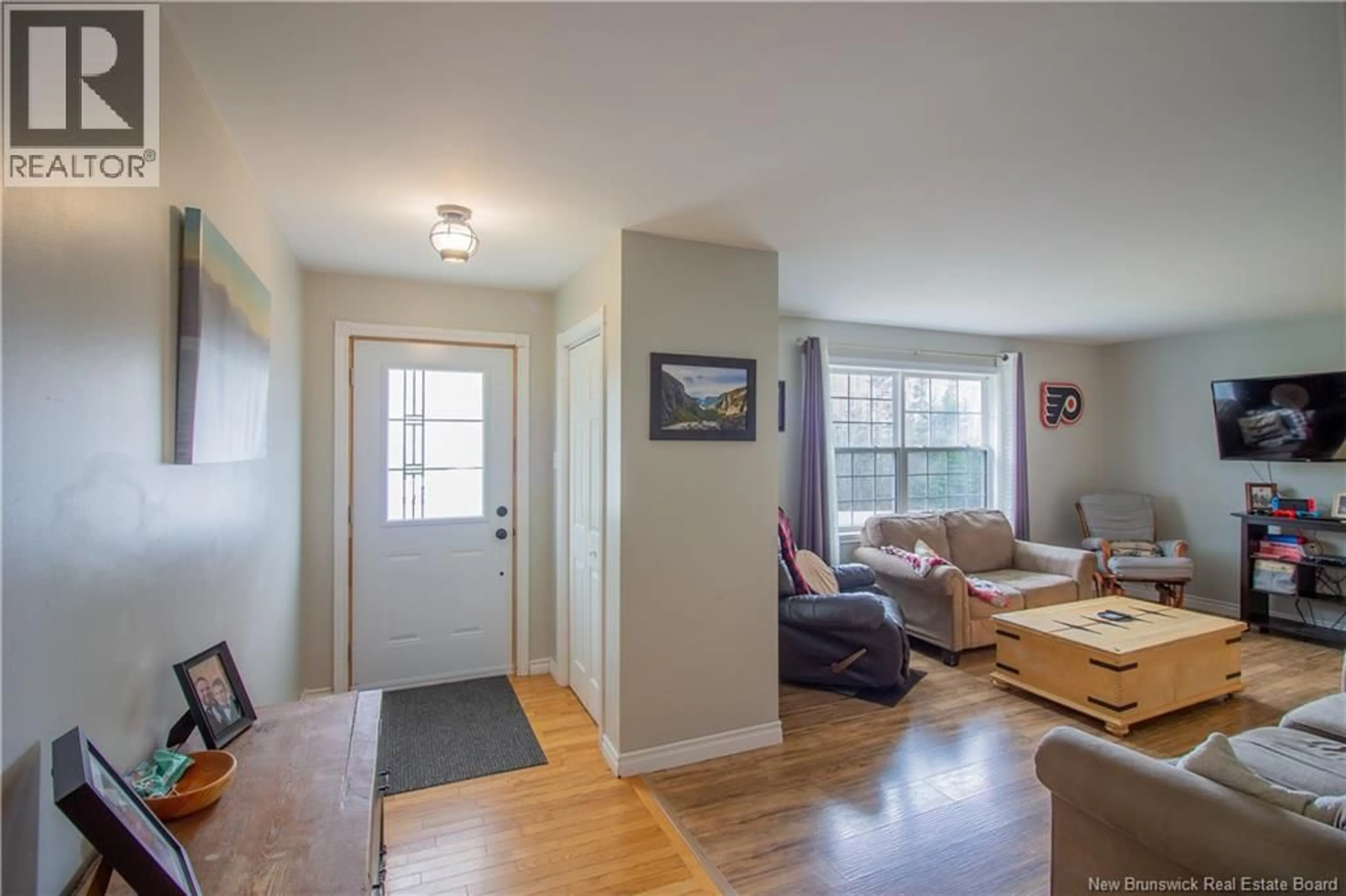 Living room with furniture, wood/laminate floor for 68 DONLEA DRIVE, Hampton New Brunswick E5N5K3