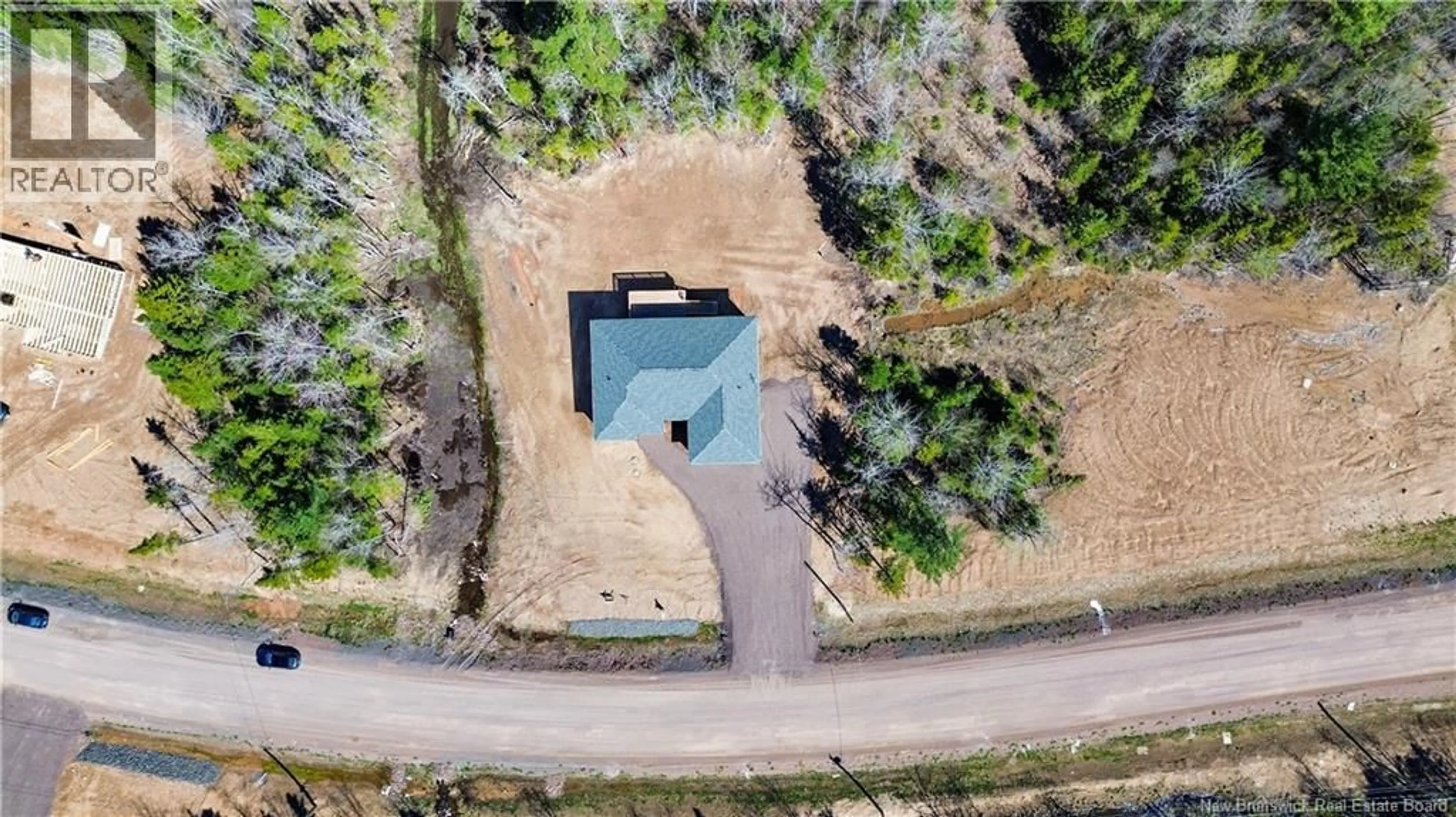 A pic from outside/outdoor area/front of a property/back of a property/a pic from drone, unknown for 38 MAEFIELD STREET, Lower Coverdale New Brunswick E1J0E7