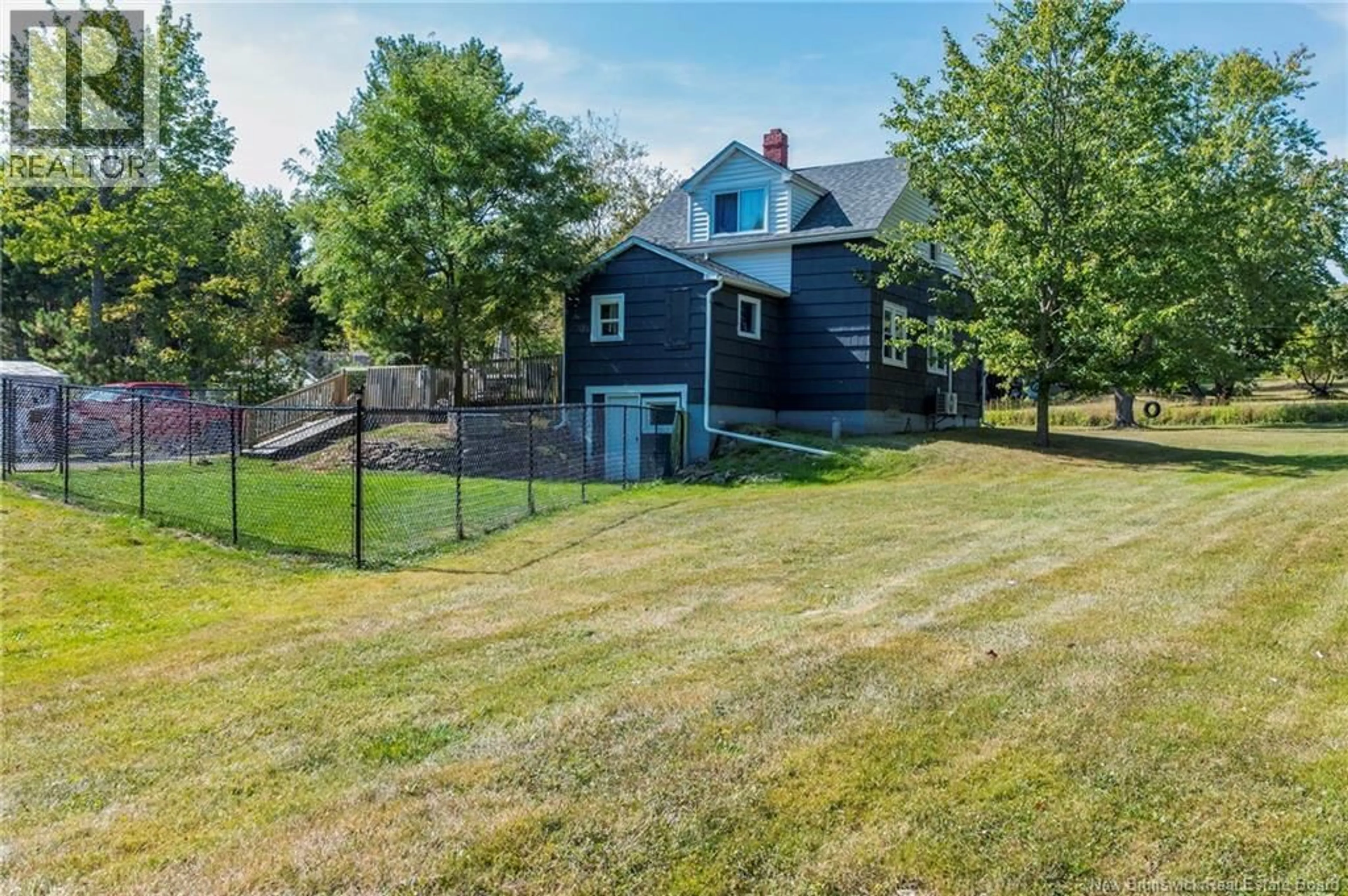 A pic from outside/outdoor area/front of a property/back of a property/a pic from drone, unknown for 1519 ROUTE 114, Fundy New Brunswick E1J1G9