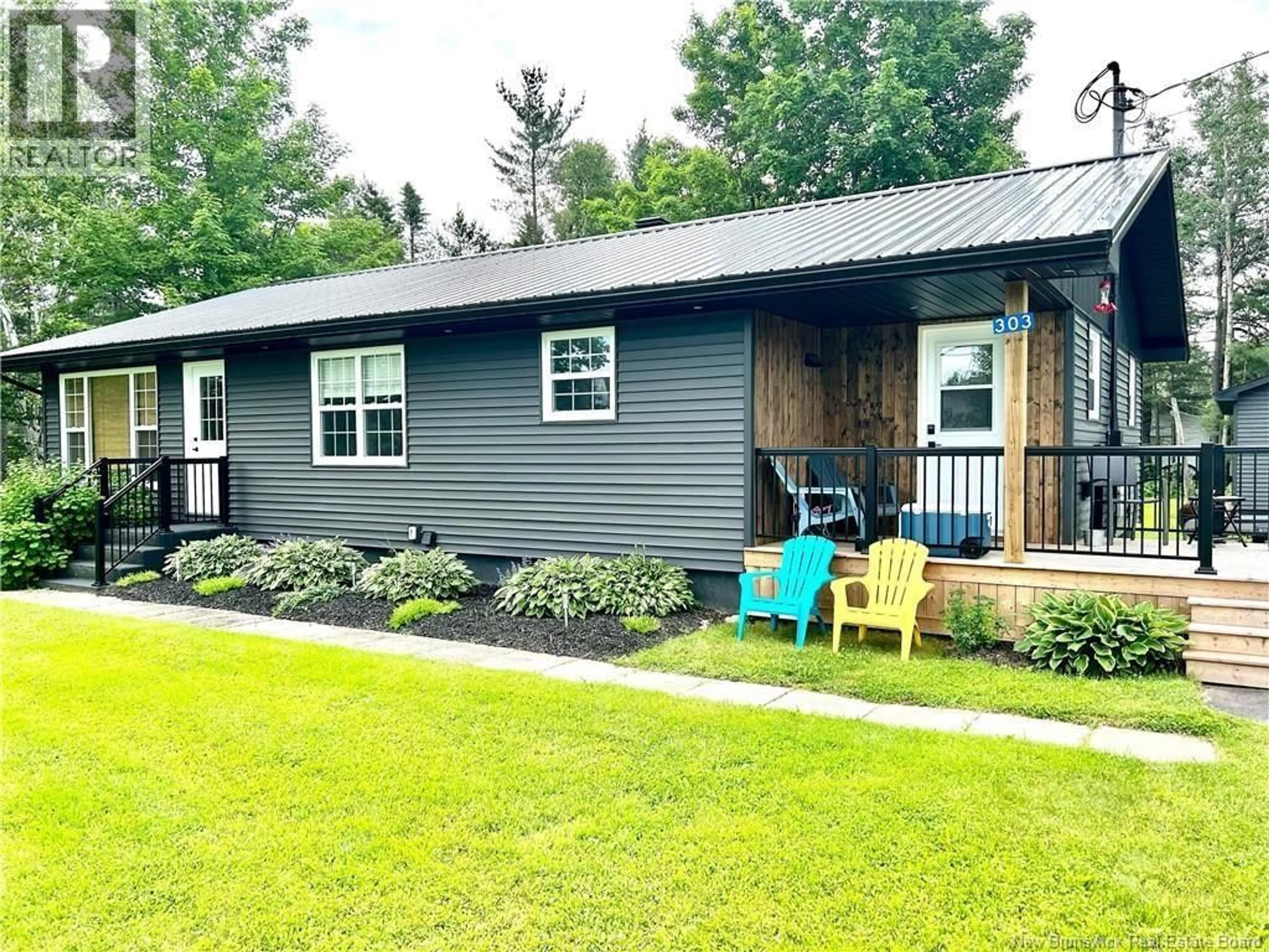 Home with vinyl exterior material, street for 303 SAINT CHARLES SUD, Saint-Charles New Brunswick E4W4V5