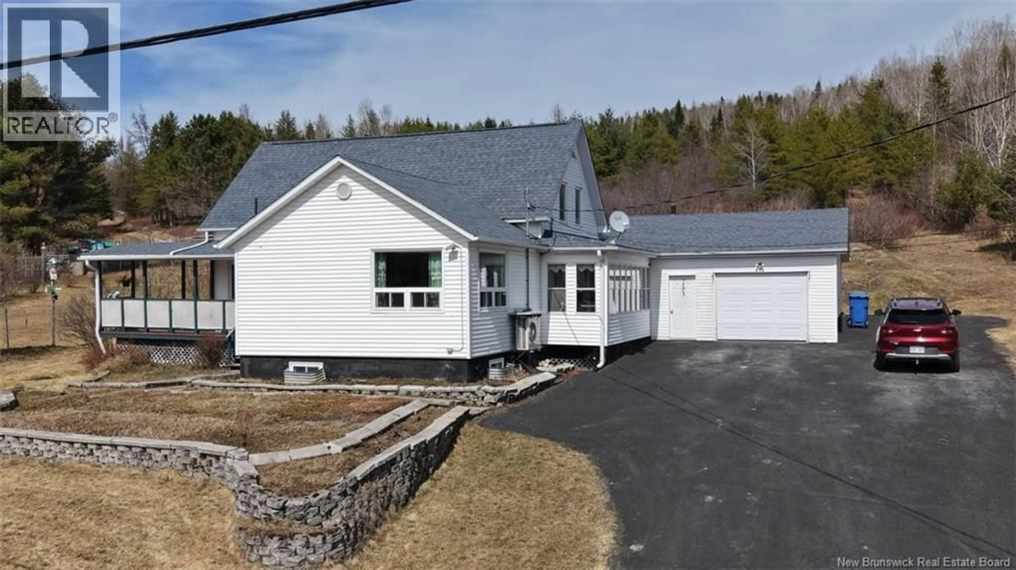 Home with vinyl exterior material, street for 243 RIVIERE VERTE ROAD, Rivière-Verte New Brunswick E7A3A1