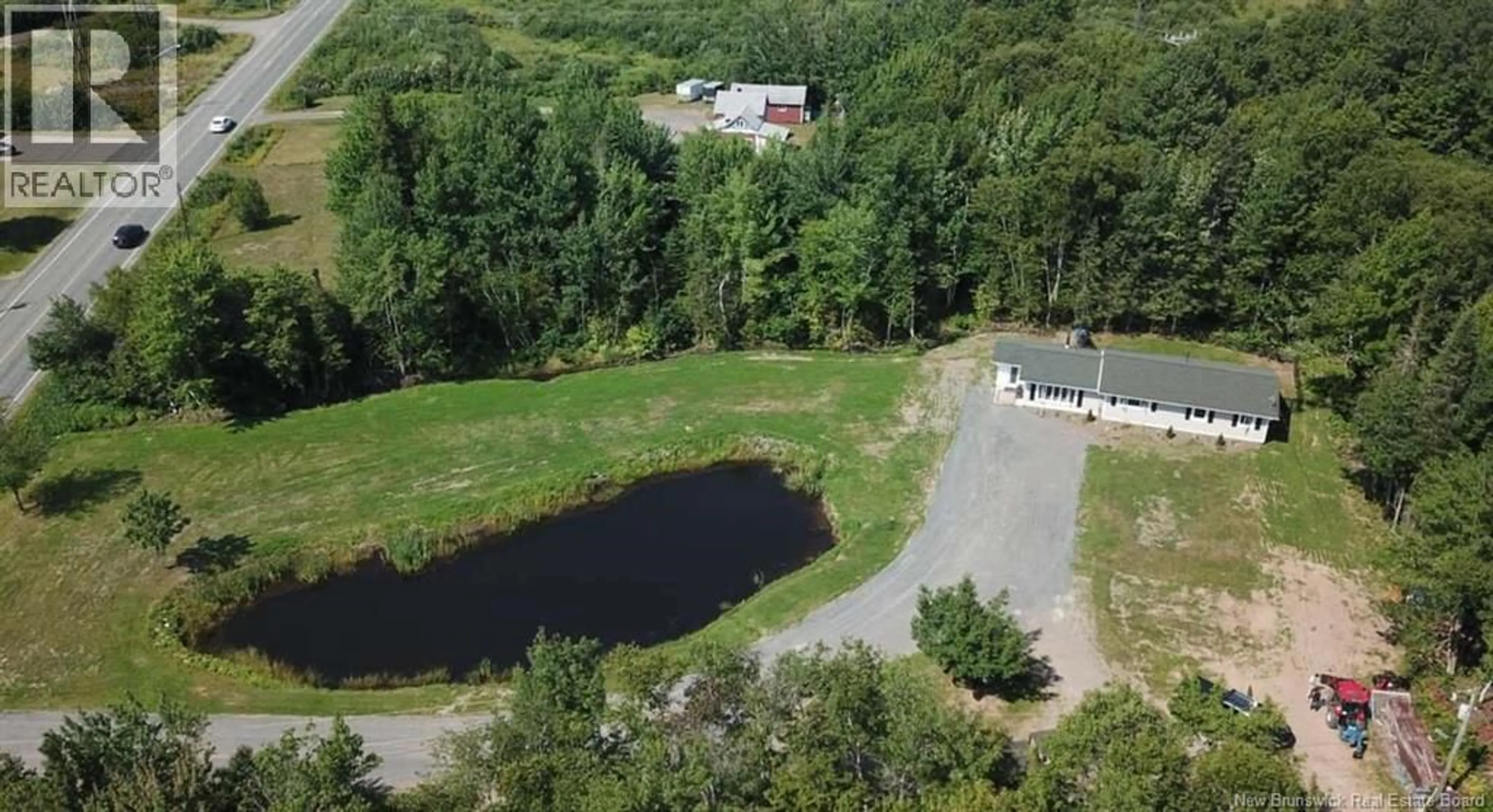 A pic from outside/outdoor area/front of a property/back of a property/a pic from drone, water/lake/river/ocean view for 922 ROBERTVILLE, Robertville New Brunswick E8K2K5