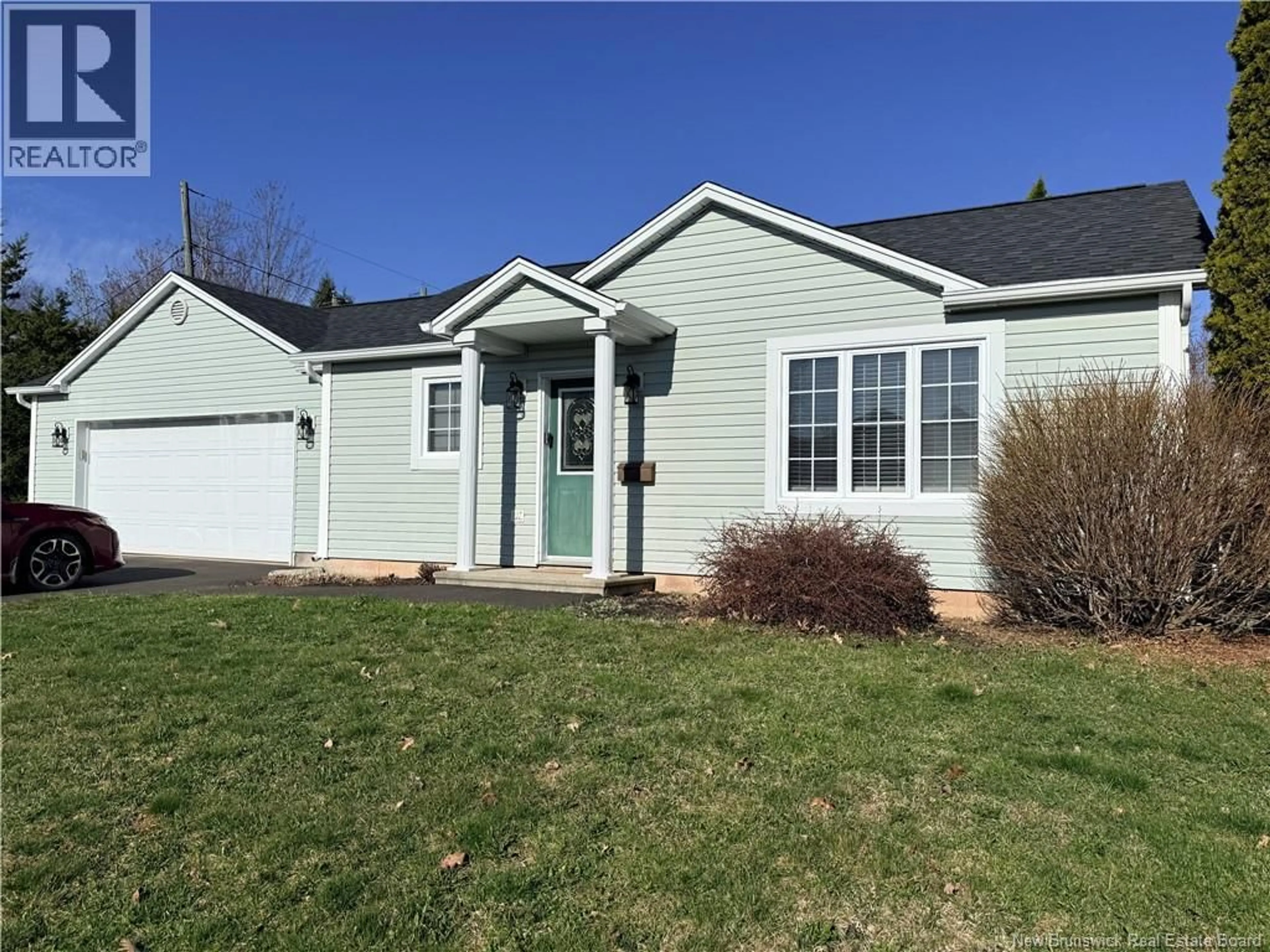 Home with vinyl exterior material, street for 32-34 MCANDREW STREET, Moncton New Brunswick E1G4Z3