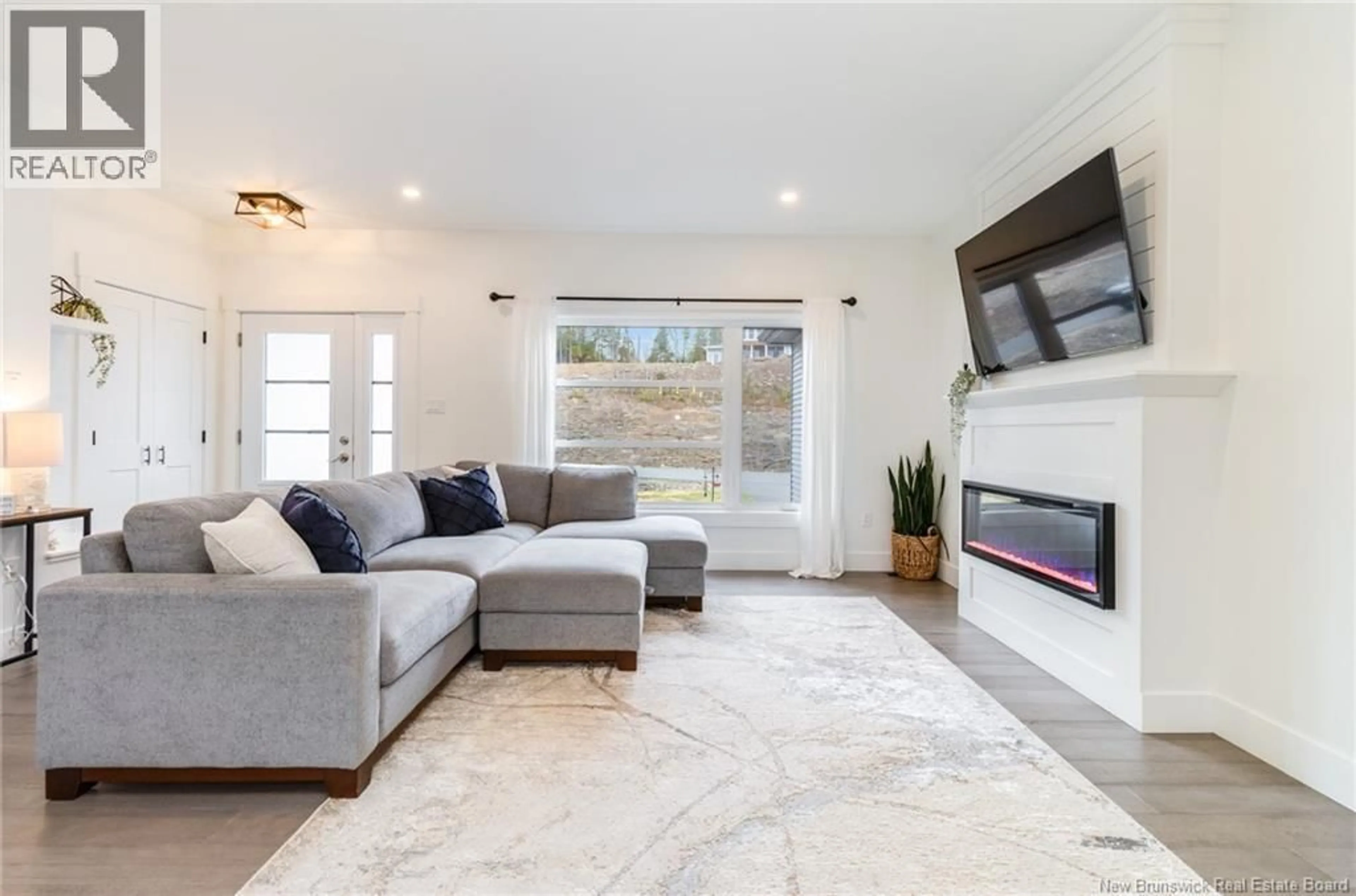 Living room with furniture, ceramic/tile floor for 54 GOLDEN EAGLE DRIVE, Hanwell New Brunswick E3C0H3