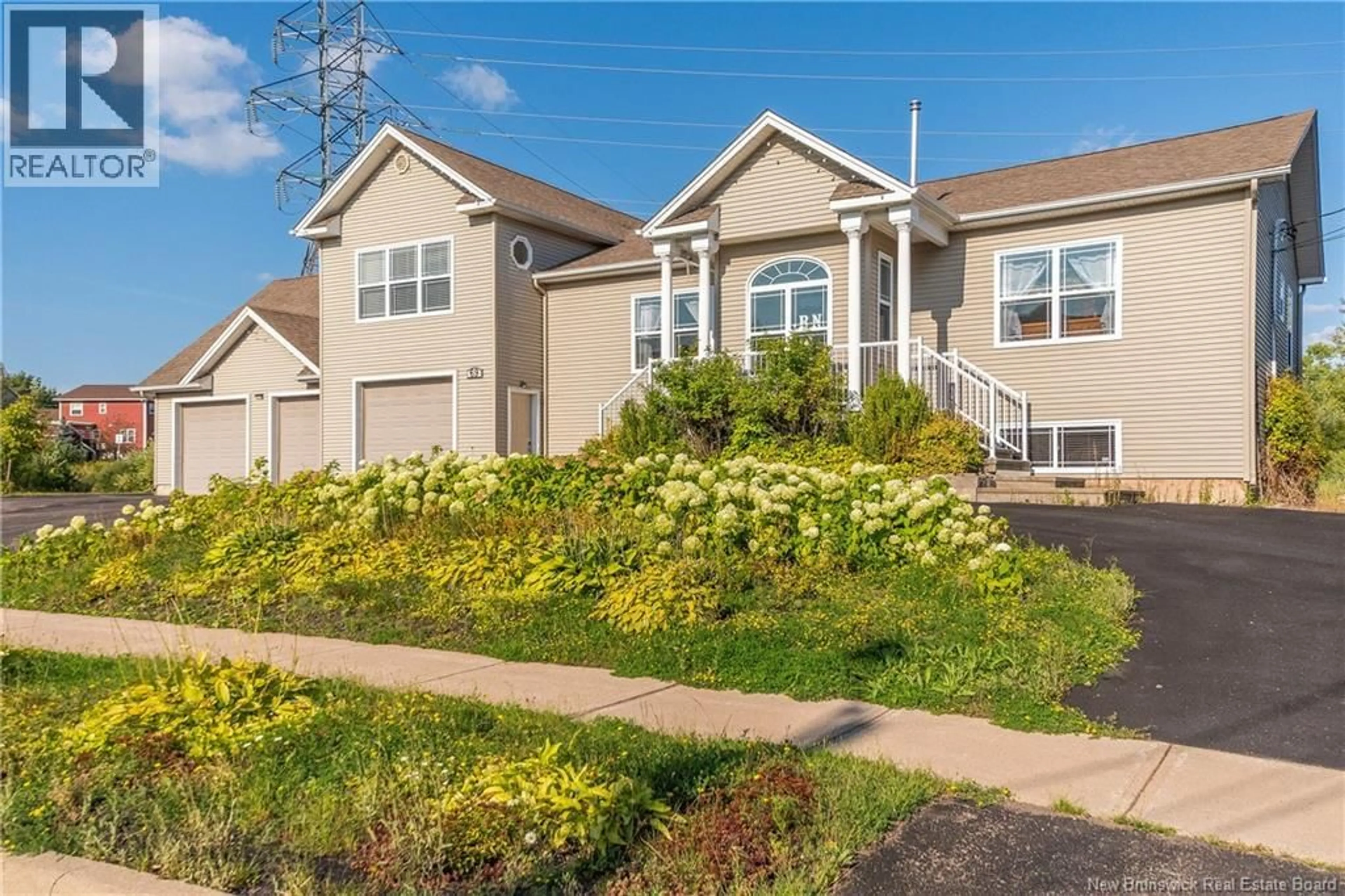 Home with vinyl exterior material, street for 69 WHISPERWOOD DRIVE, Moncton New Brunswick E1G0P7