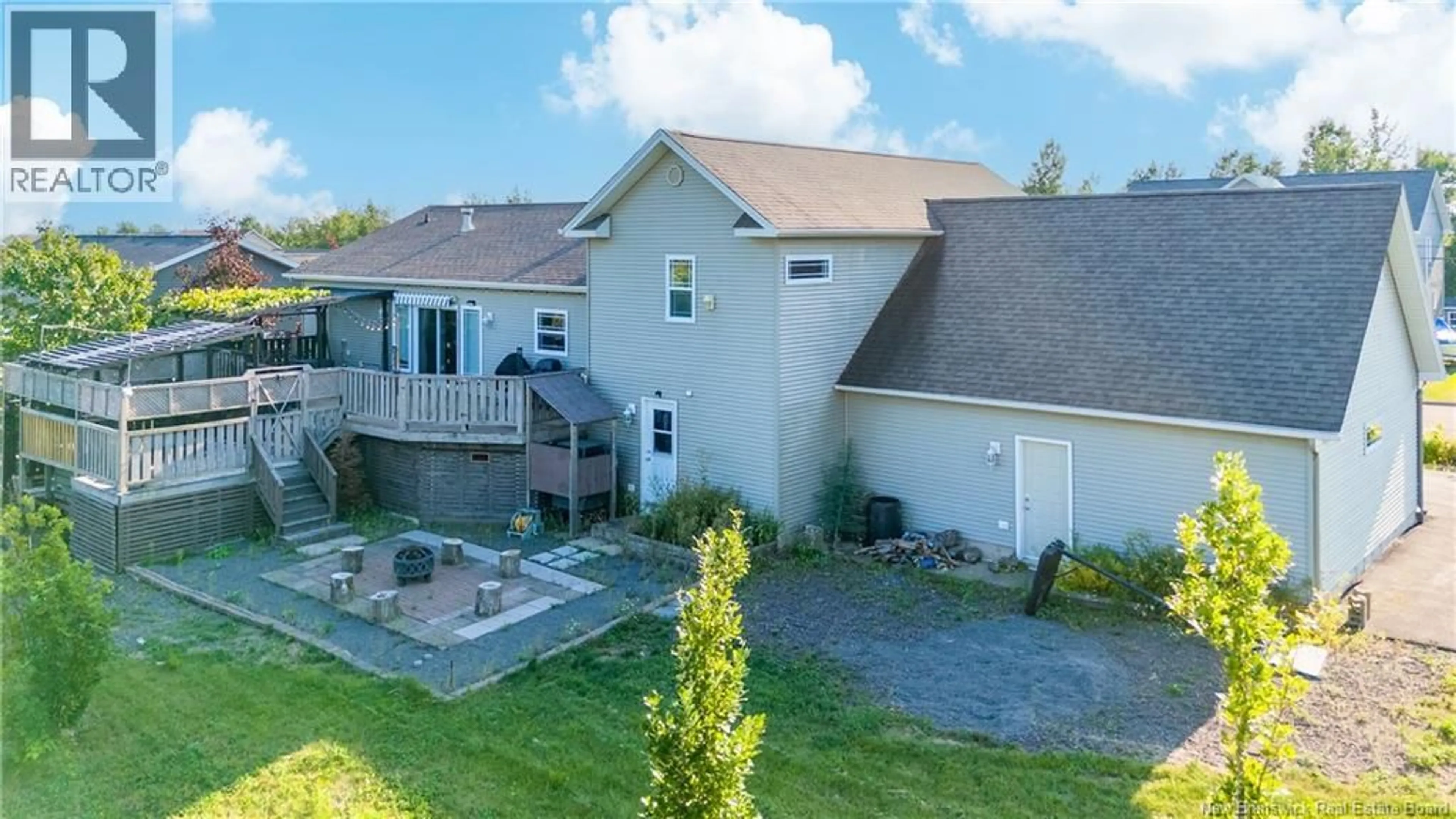 A pic from outside/outdoor area/front of a property/back of a property/a pic from drone, unknown for 69 WHISPERWOOD DRIVE, Moncton New Brunswick E1G0P7