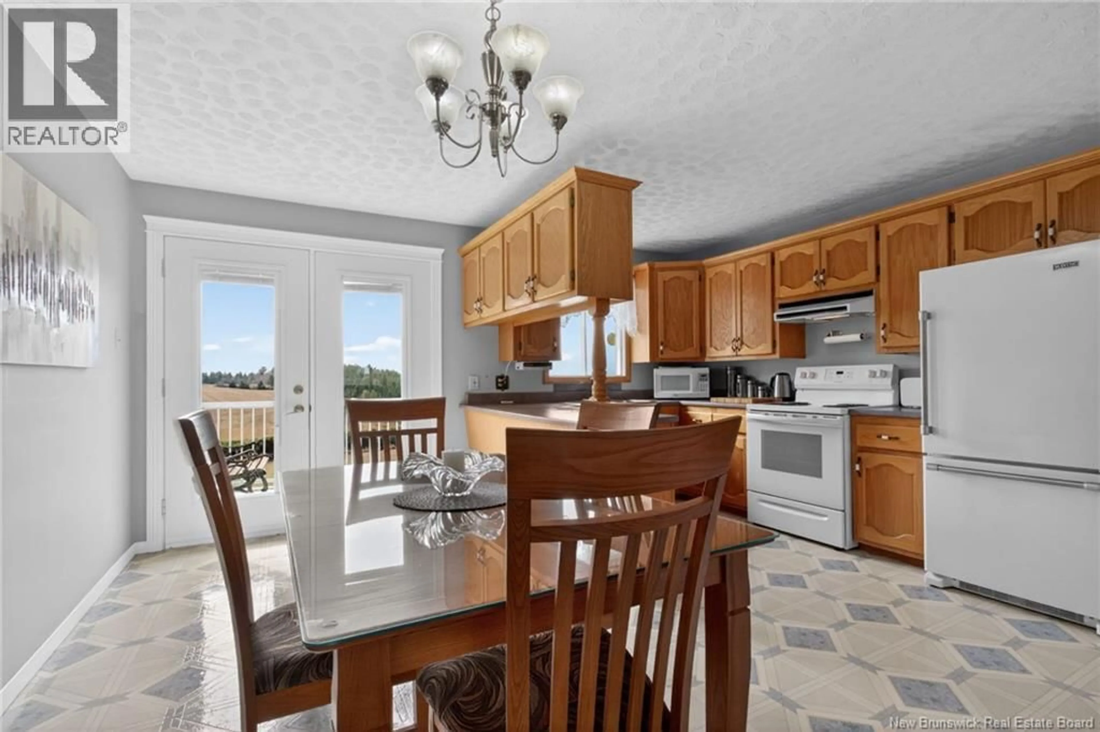 Open concept kitchen, ceramic/tile floor for 895 ROUTE 515, Bouctouche Cove New Brunswick E4S4H9