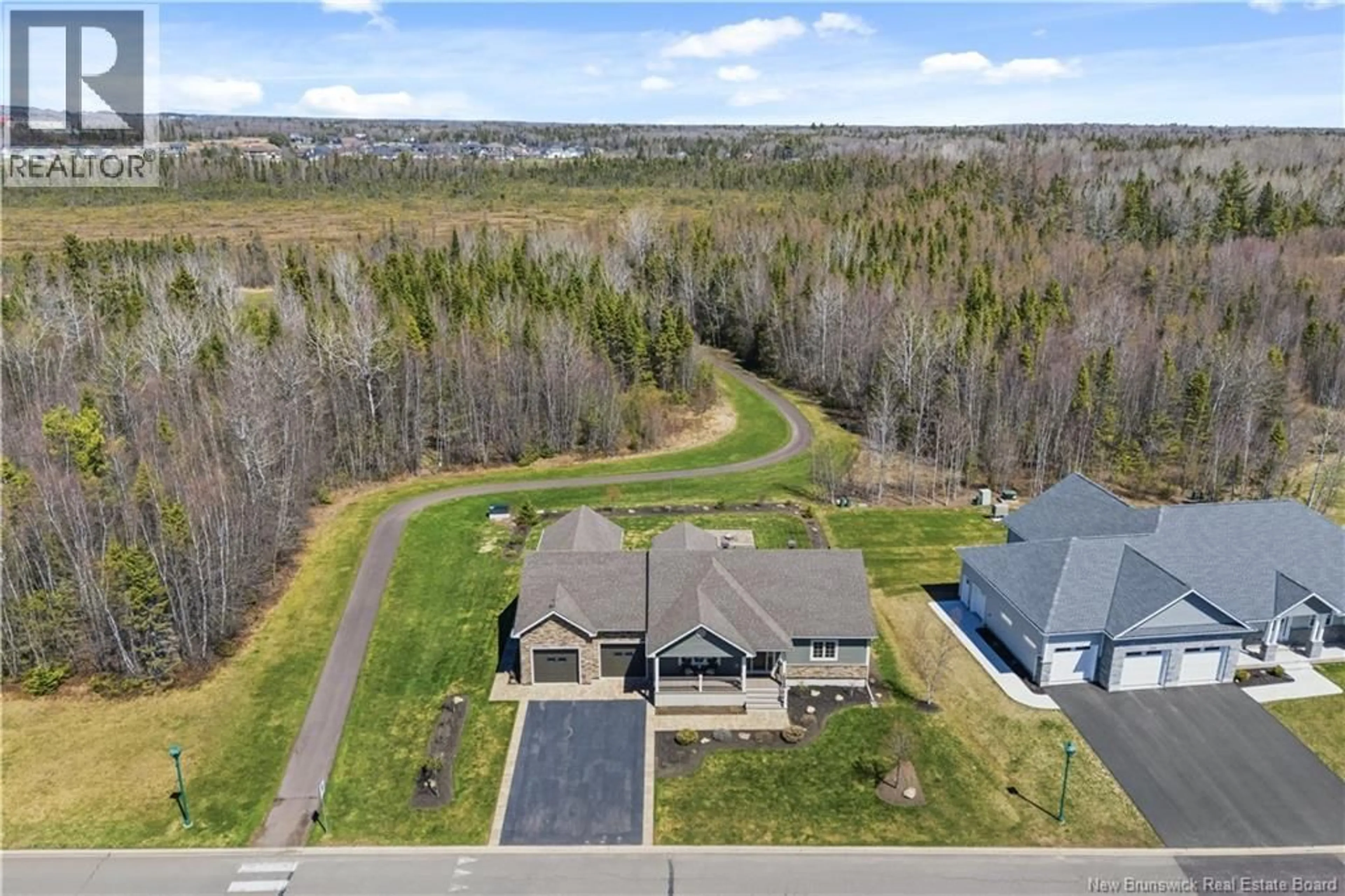 A pic from outside/outdoor area/front of a property/back of a property/a pic from drone, water/lake/river/ocean view for 115 ROYAL OAKS BOULEVARD, Irishtown New Brunswick E1H2P7