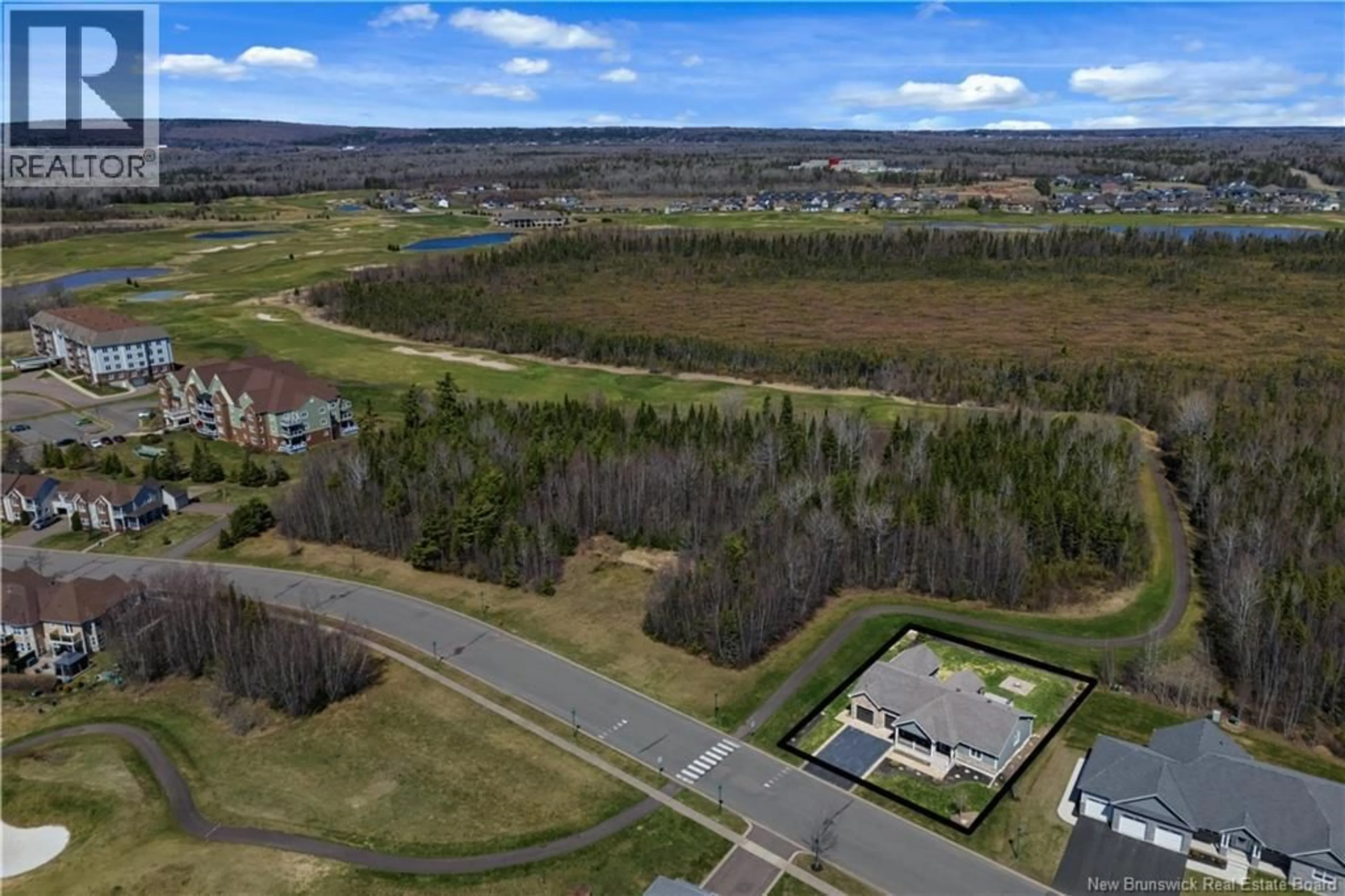 A pic from outside/outdoor area/front of a property/back of a property/a pic from drone, unknown for 115 ROYAL OAKS BOULEVARD, Irishtown New Brunswick E1H2P7