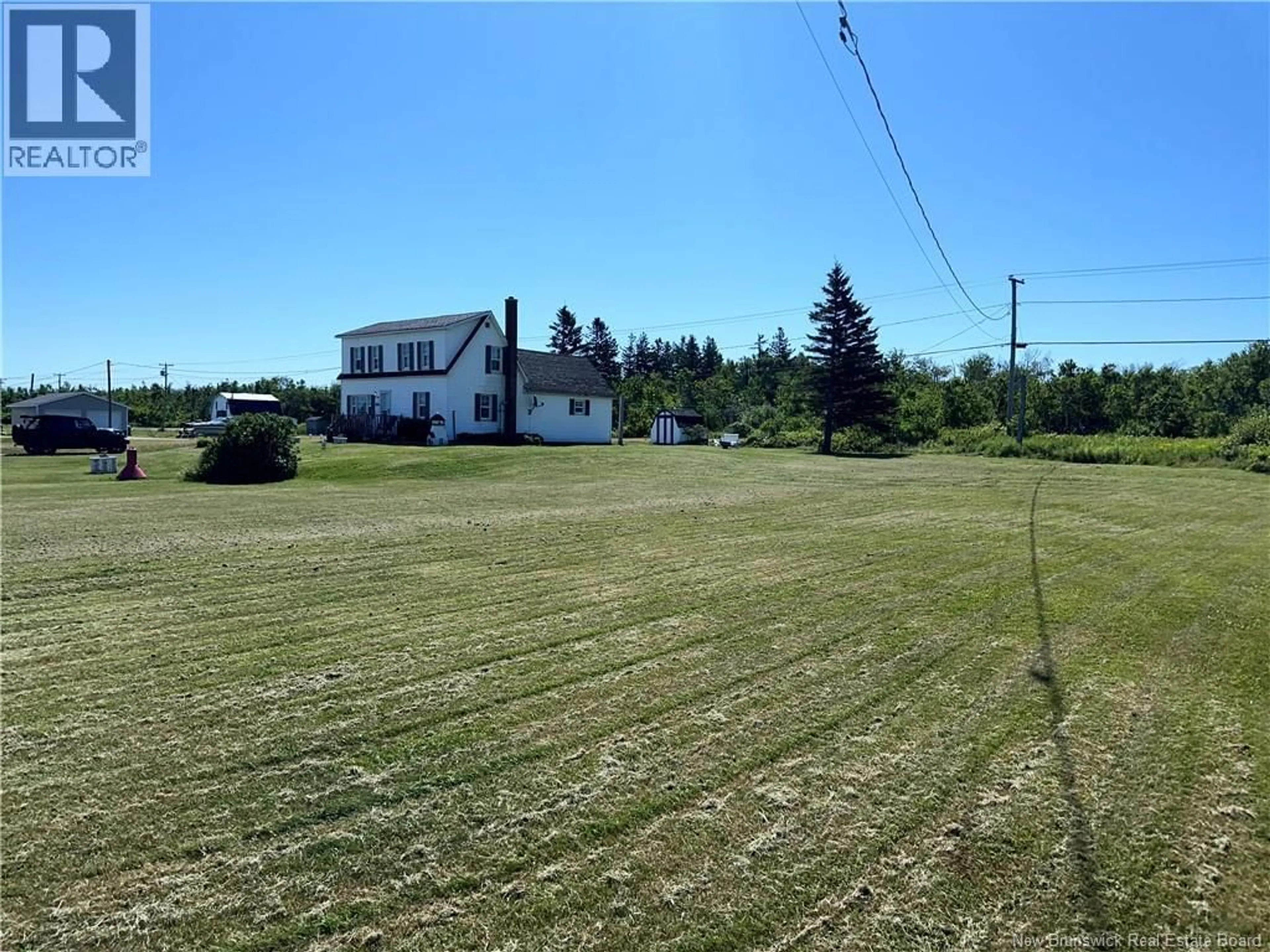 A pic from outside/outdoor area/front of a property/back of a property/a pic from drone, water/lake/river/ocean view for 124 ESCUMINAC PT ROAD, Escuminac New Brunswick E9A1V5
