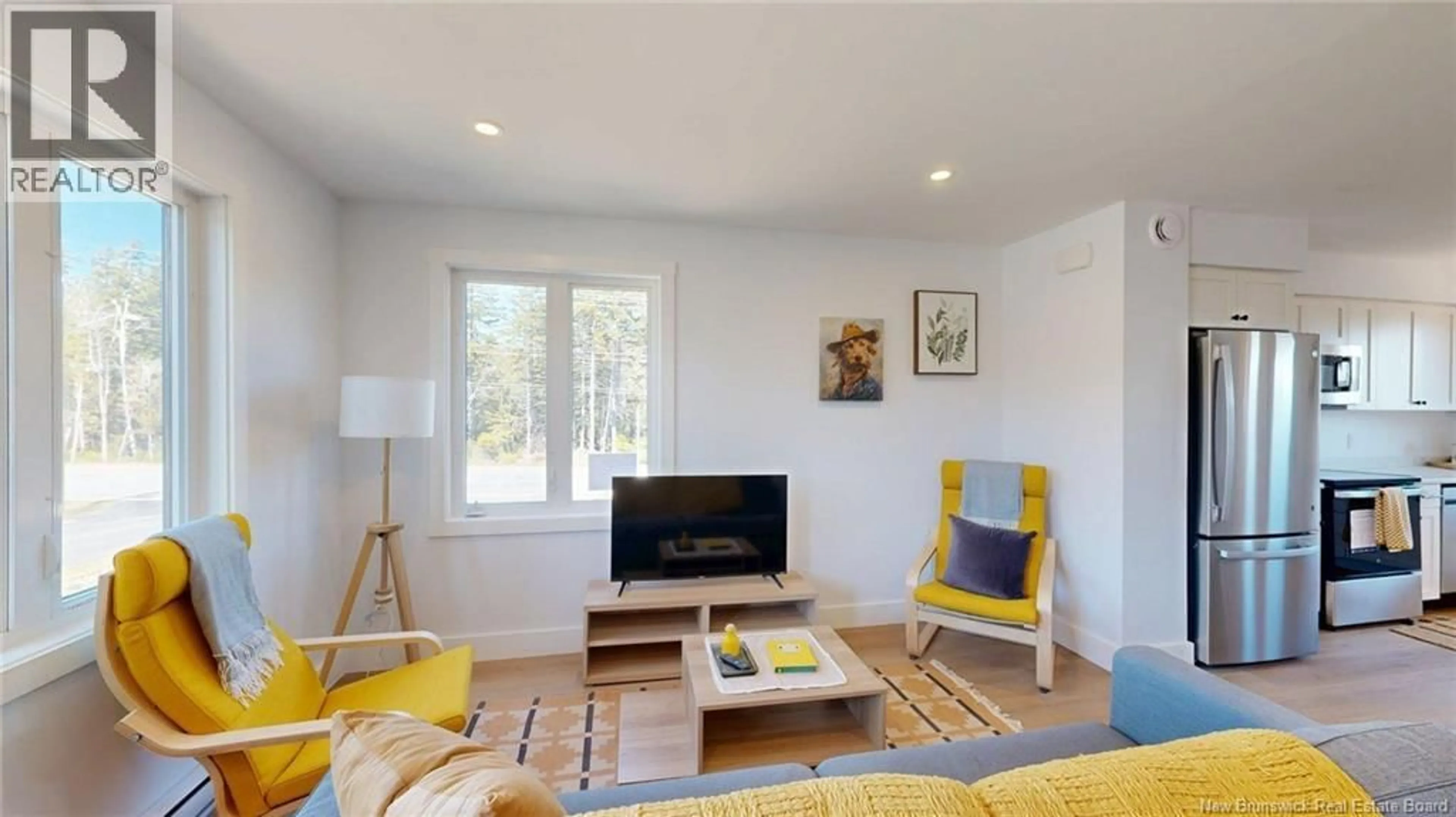 Living room with furniture, wood/laminate floor for 101 - 1-290 COLONEL NASE BOULEVARD, Grand Bay-Westfield New Brunswick E5K0G6