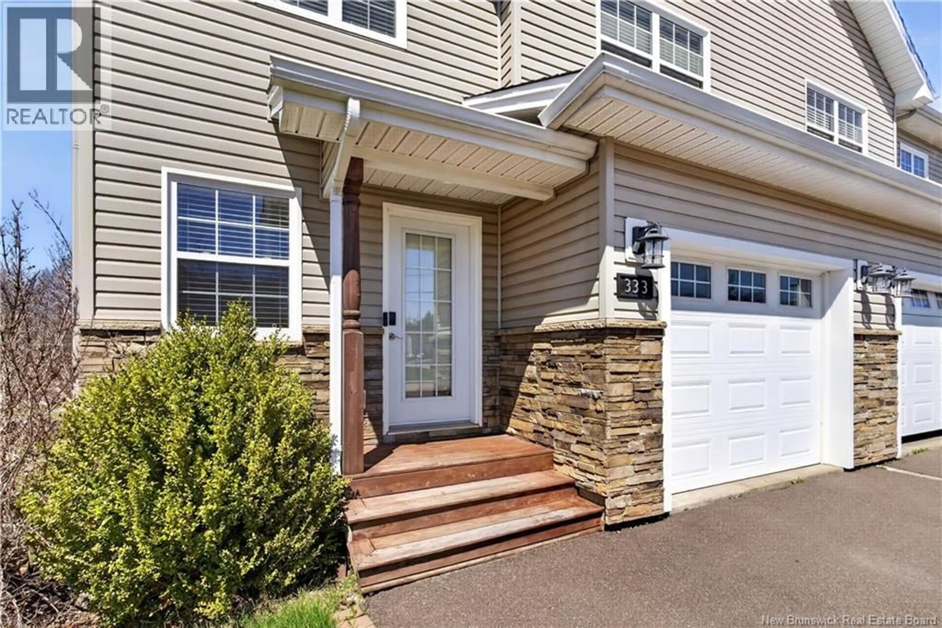 Home with vinyl exterior material, street for 333 DOLBEAU STREET, Dieppe New Brunswick E1A9P9