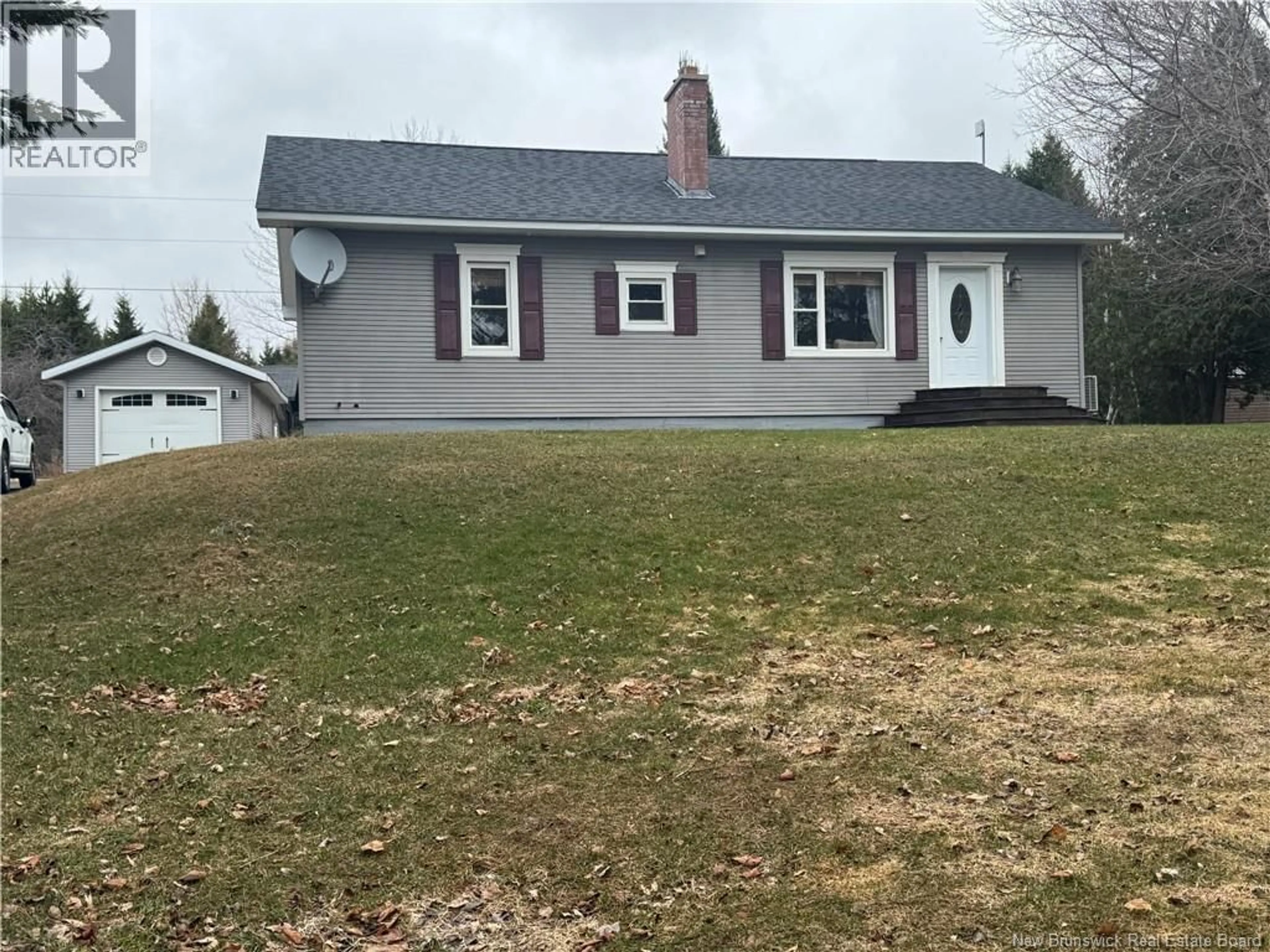 Home with vinyl exterior material, street for 10252 105 ROUTE, Beechwood New Brunswick E7J2A7