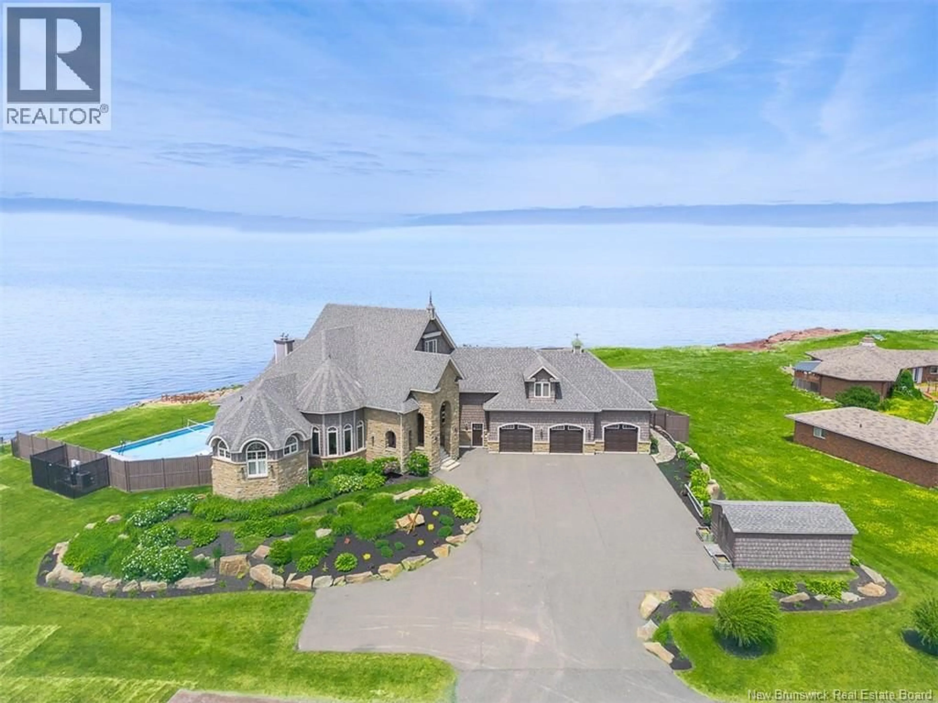 A pic from outside/outdoor area/front of a property/back of a property/a pic from drone, water/lake/river/ocean view for 622 JANICE LANE, Cap-Pelé New Brunswick E4N1V6