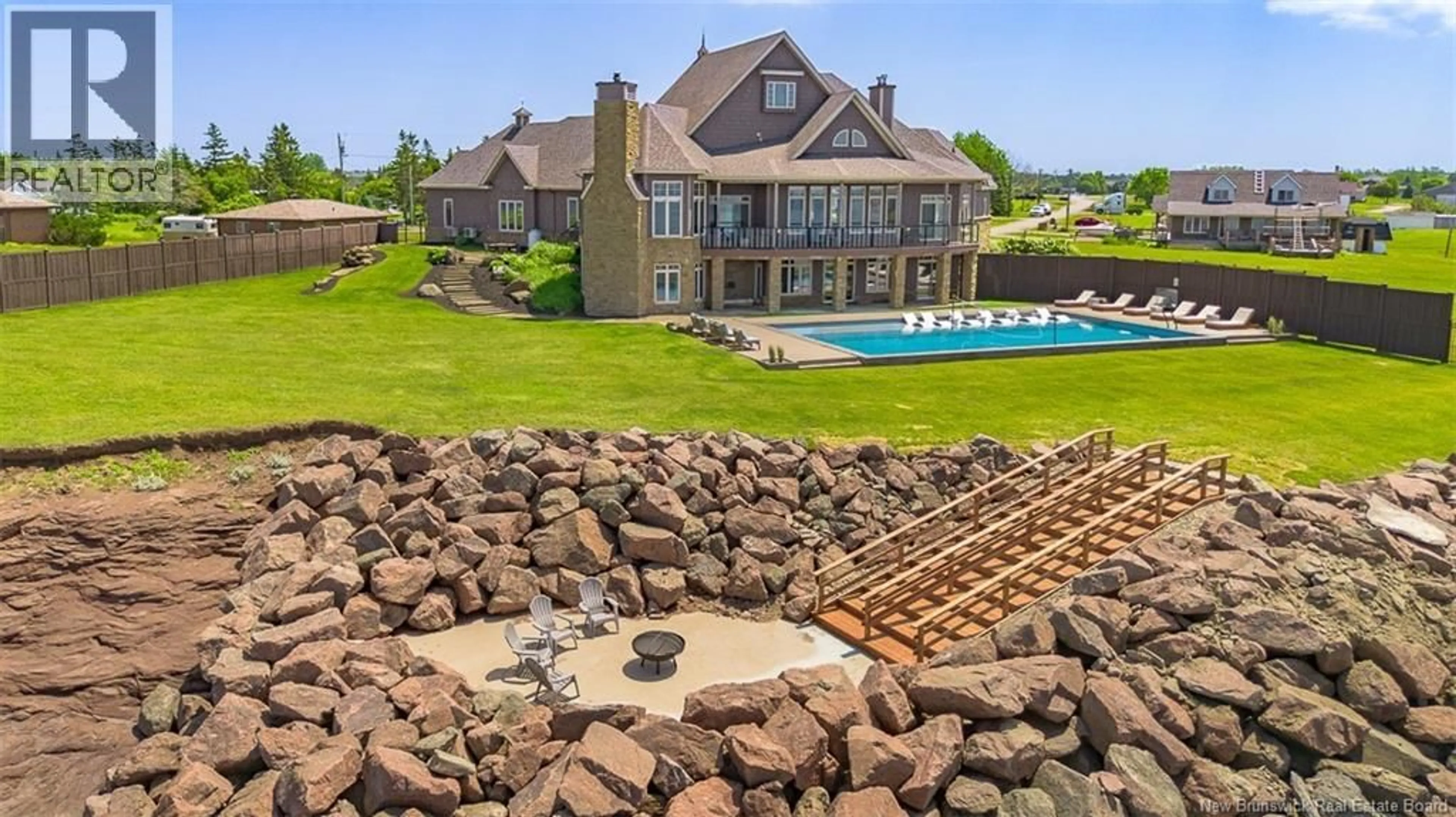 A pic from outside/outdoor area/front of a property/back of a property/a pic from drone, water/lake/river/ocean view for 622 JANICE LANE, Cap-Pelé New Brunswick E4N1V6