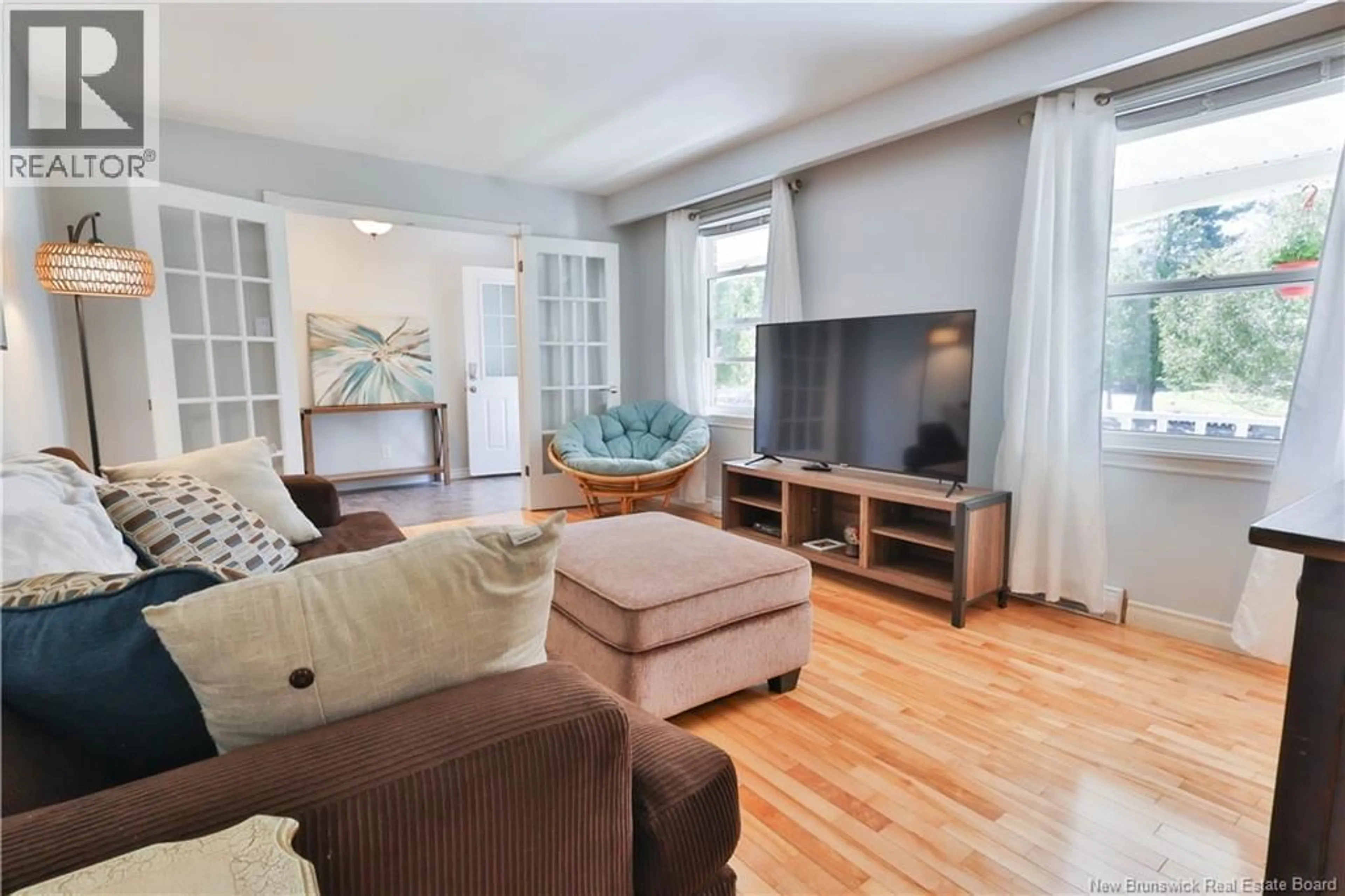 Living room with furniture, wood/laminate floor for 37 CEDAR RIDGE BOULEVARD, Quispamsis New Brunswick E2E4K4