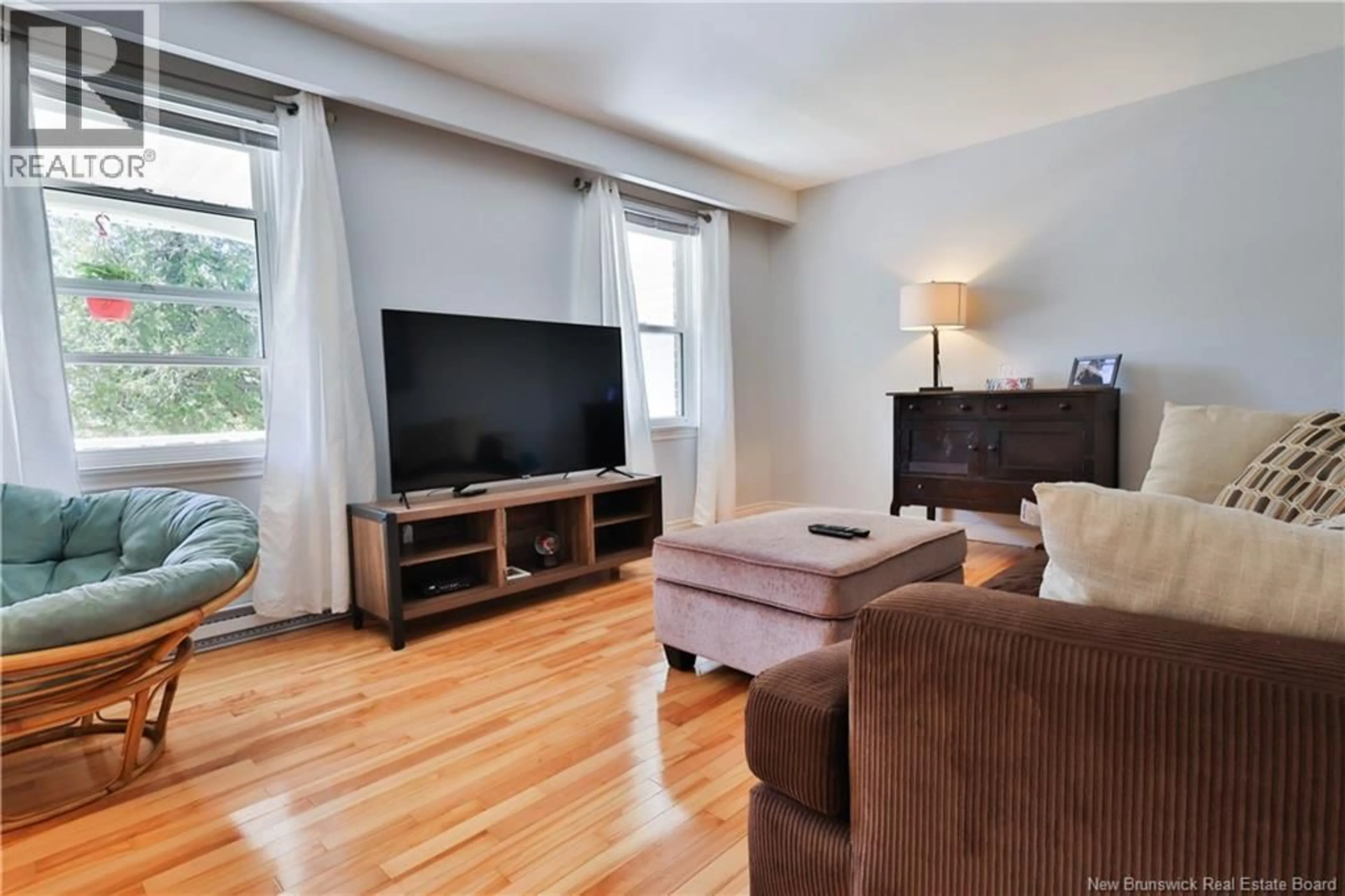 Living room with furniture, wood/laminate floor for 37 CEDAR RIDGE BOULEVARD, Quispamsis New Brunswick E2E4K4