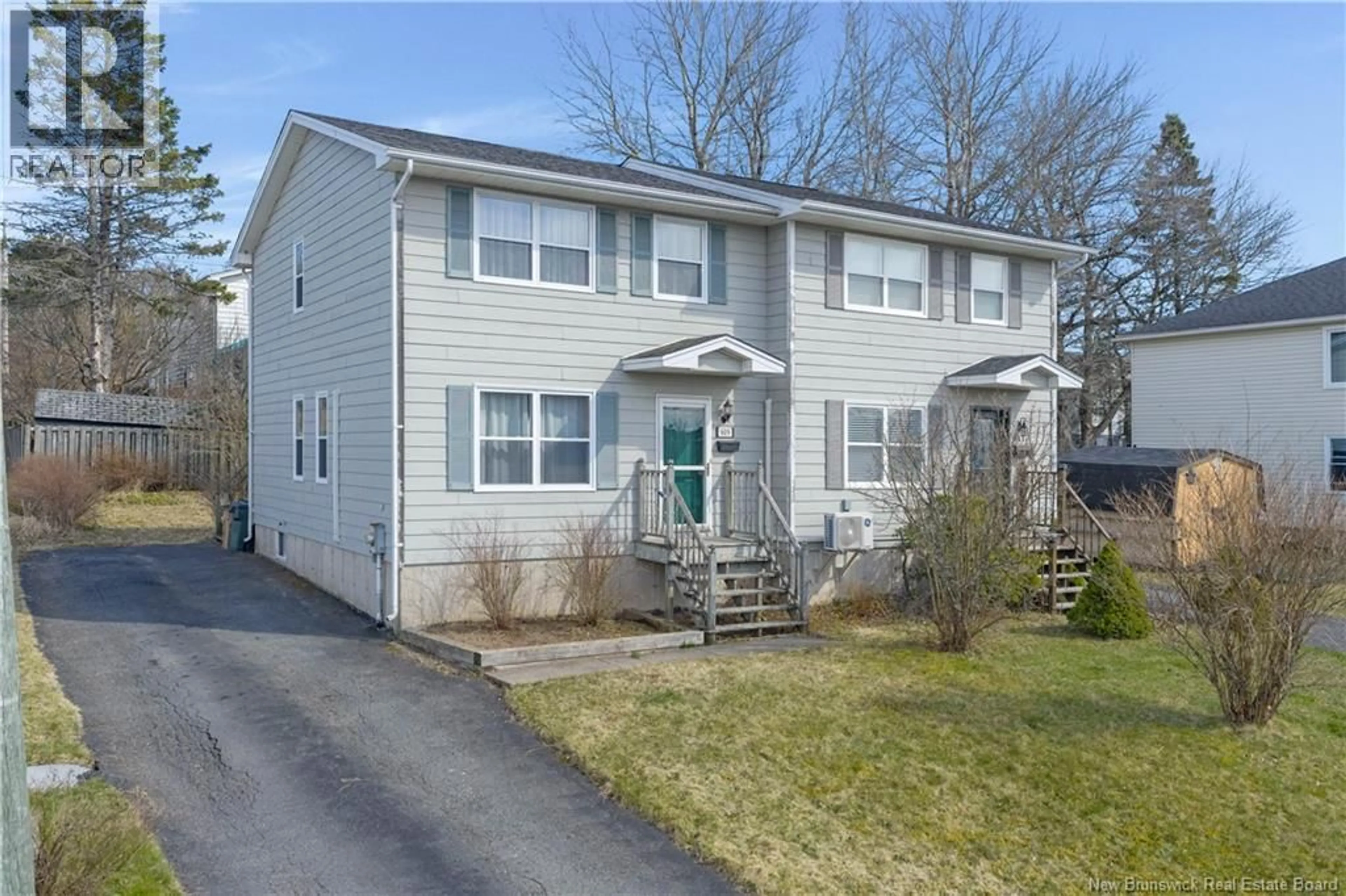 Home with vinyl exterior material, street for 609 WALLACE COURT, Saint John New Brunswick E2M3L9