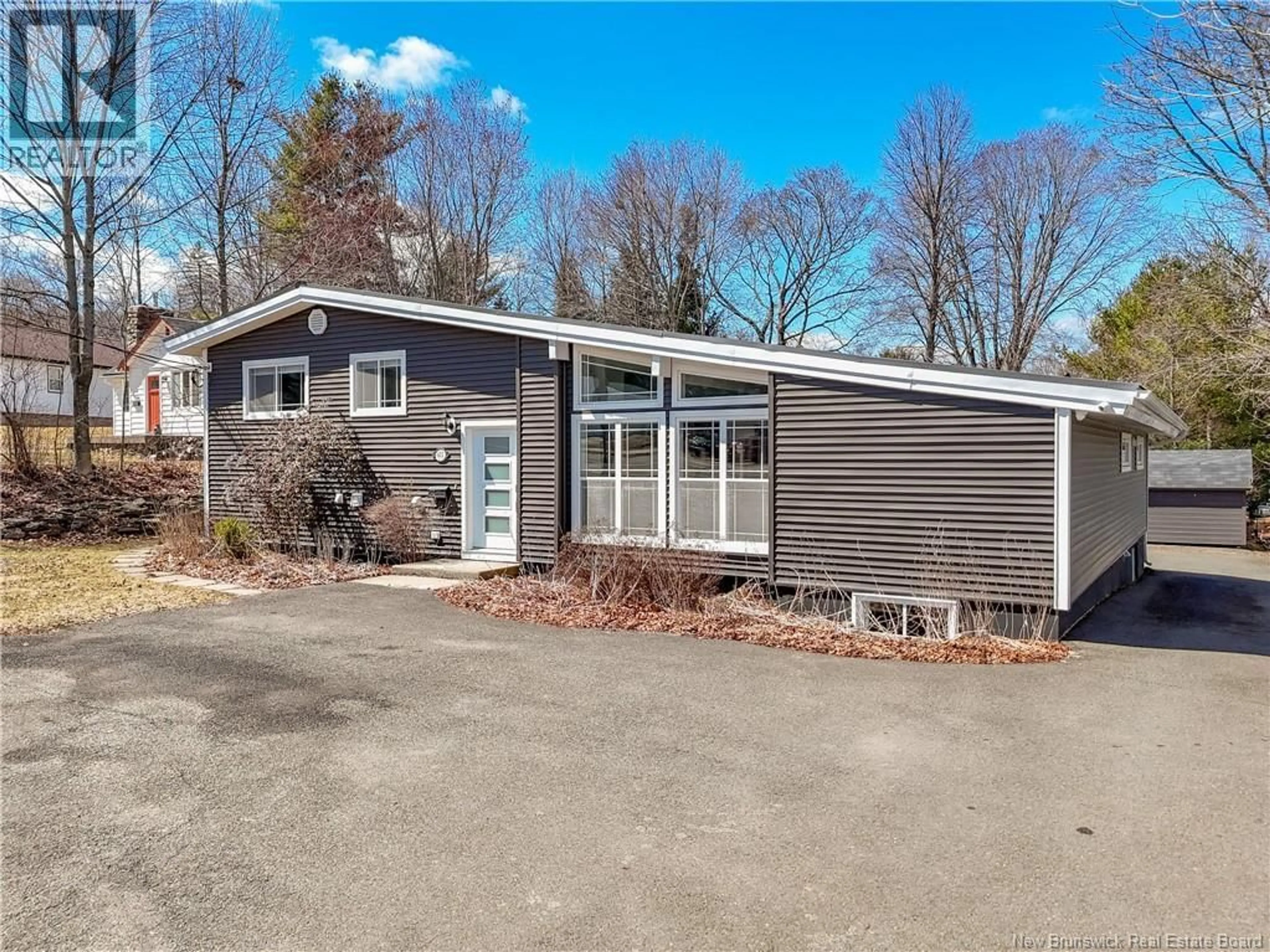 Home with vinyl exterior material, street for 675 SMYTHE STREET, Fredericton New Brunswick E3B3G2