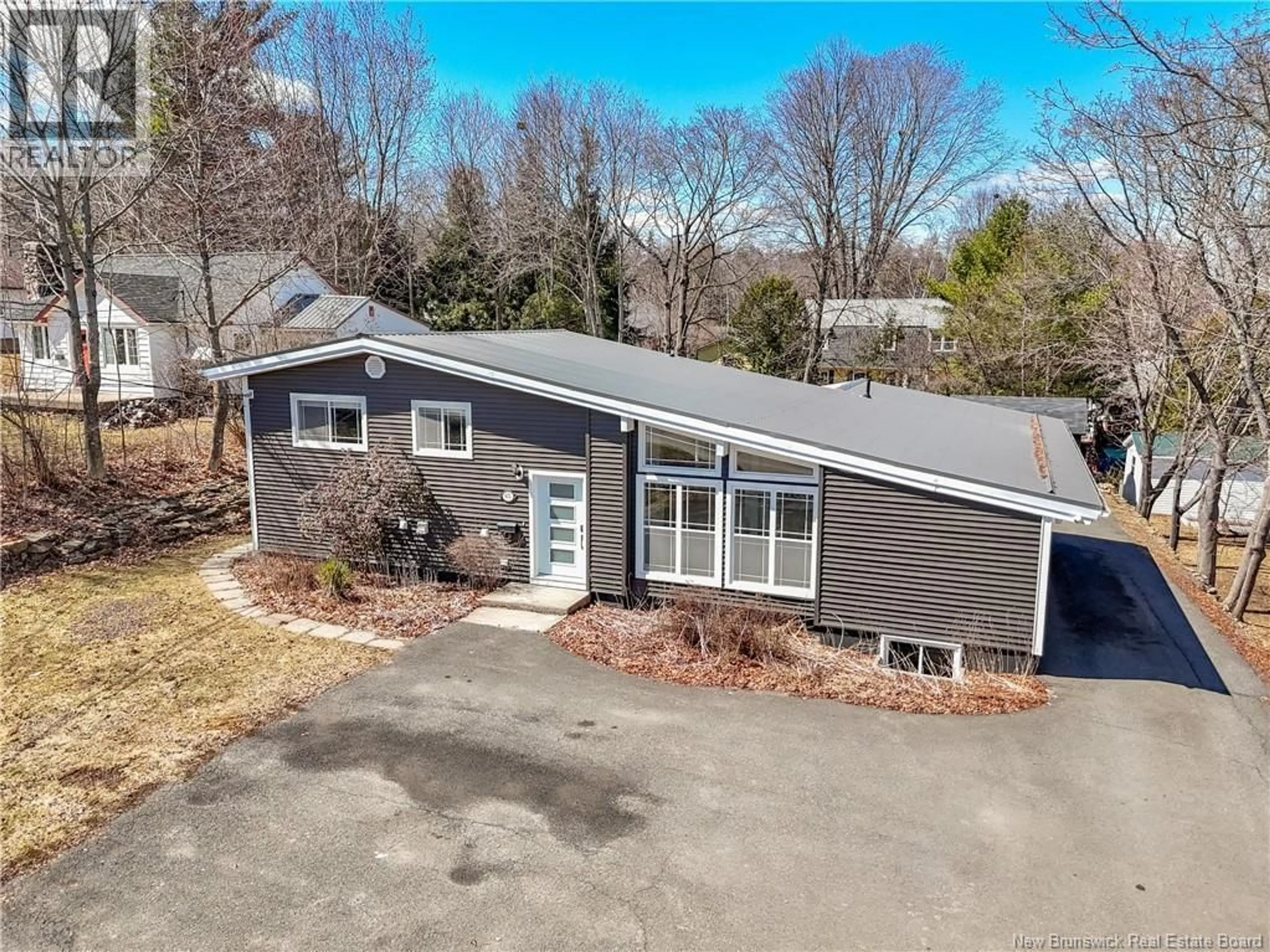 A pic from outside/outdoor area/front of a property/back of a property/a pic from drone, unknown for 675 SMYTHE STREET, Fredericton New Brunswick E3B3G2