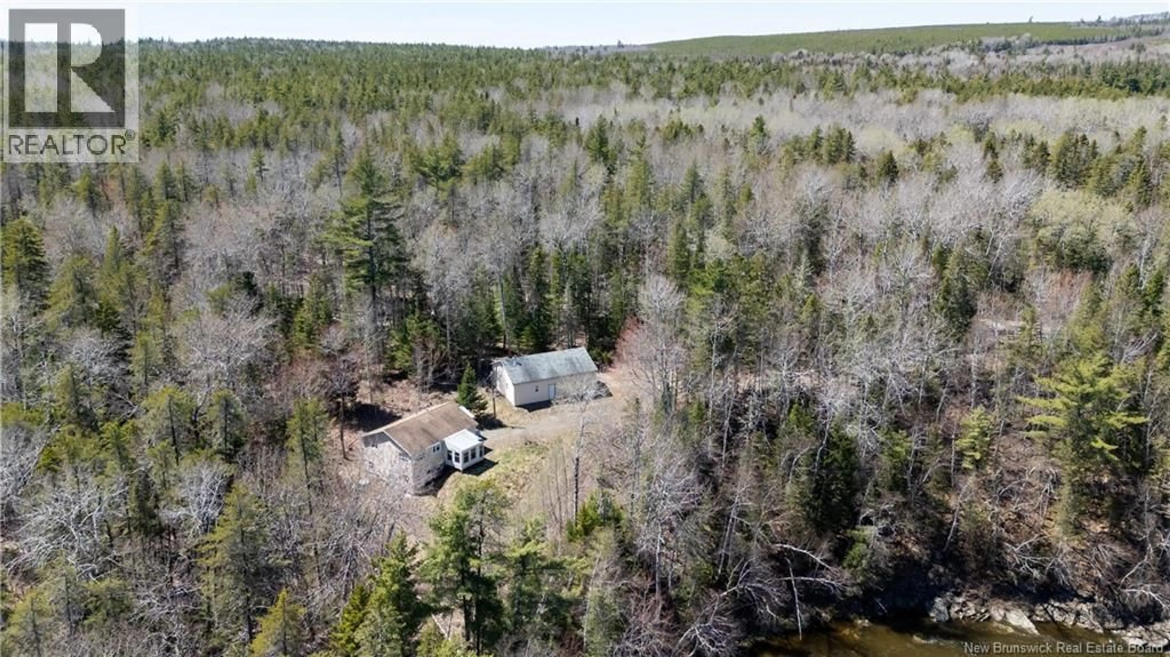 A pic from outside/outdoor area/front of a property/back of a property/a pic from drone, forest/trees view for 27 PARKINDALE ROAD, Pollett River New Brunswick E4Z3A6