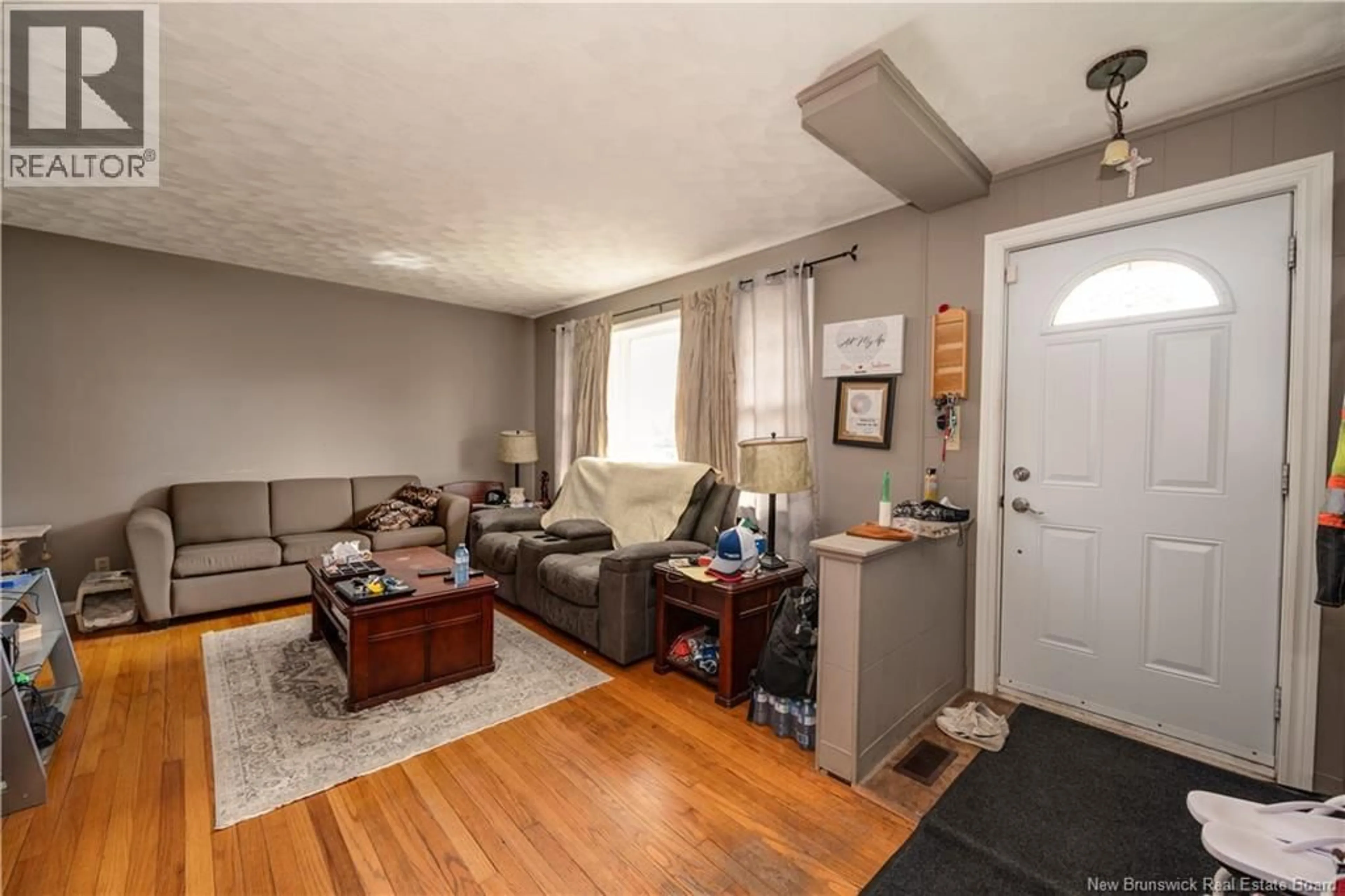 Living room with furniture, wood/laminate floor for 190 MAPLE STREET, Moncton New Brunswick E1C6A4