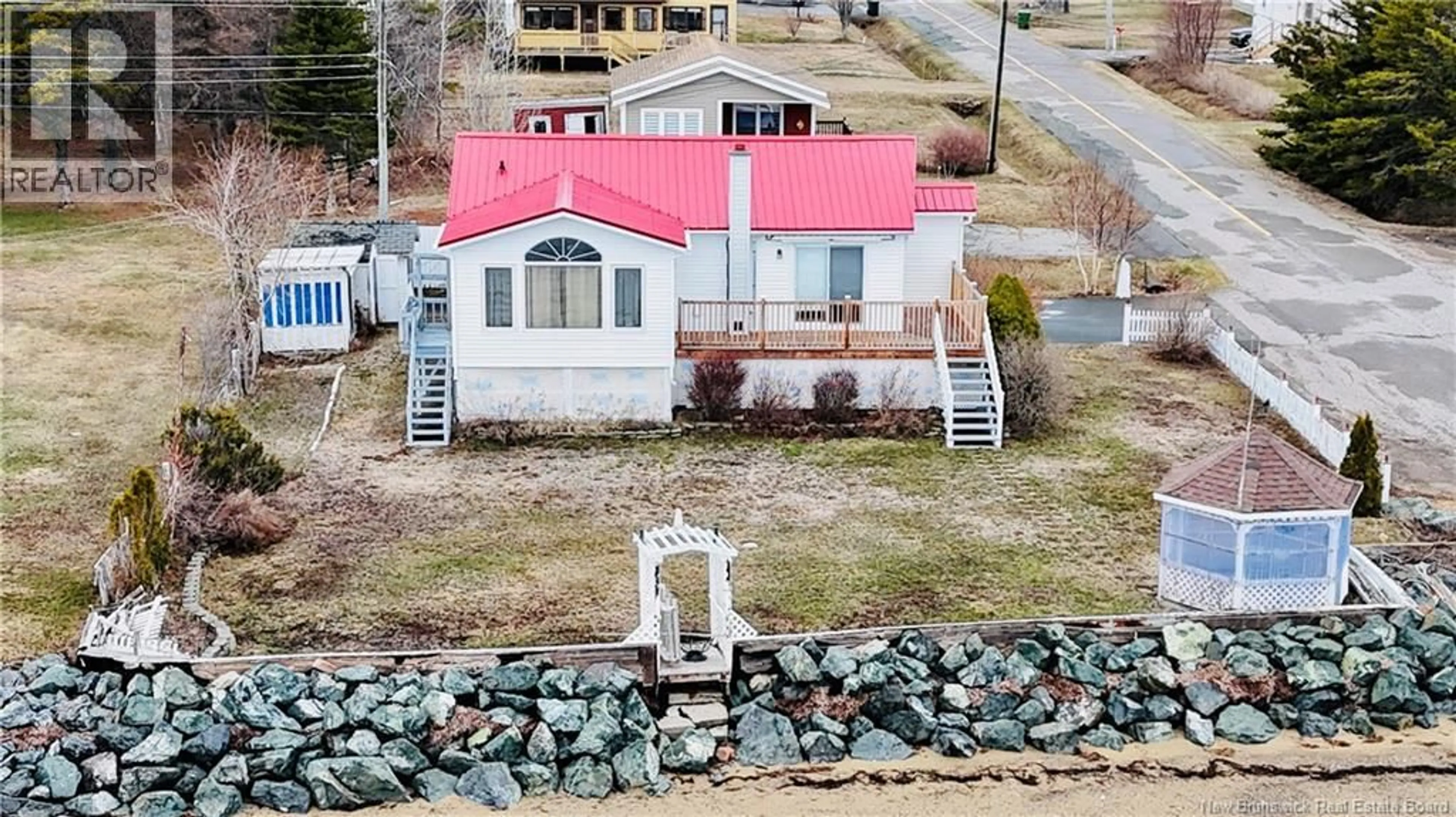 A pic from outside/outdoor area/front of a property/back of a property/a pic from drone, water/lake/river/ocean view for 52 BLANCHARD STREET, Maisonnette New Brunswick E8N1W1