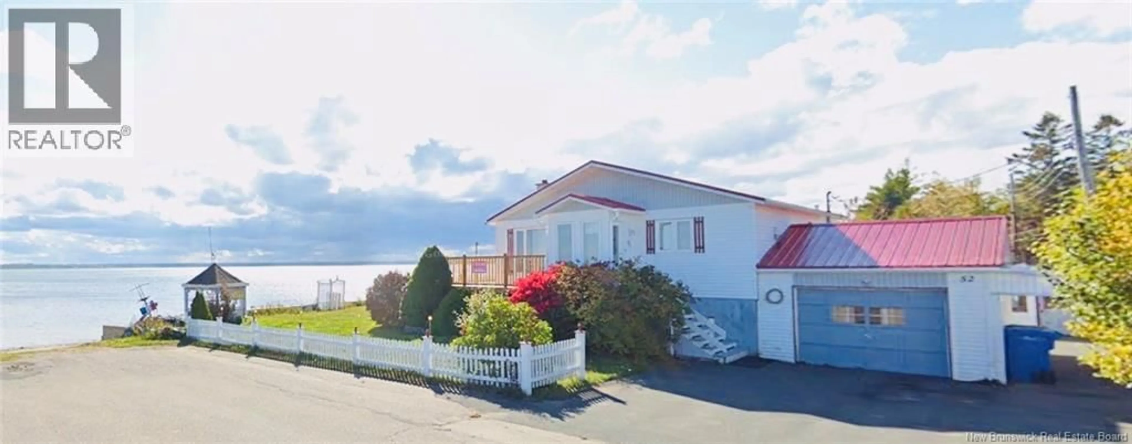 A pic from outside/outdoor area/front of a property/back of a property/a pic from drone, water/lake/river/ocean view for 52 BLANCHARD STREET, Maisonnette New Brunswick E8N1W1