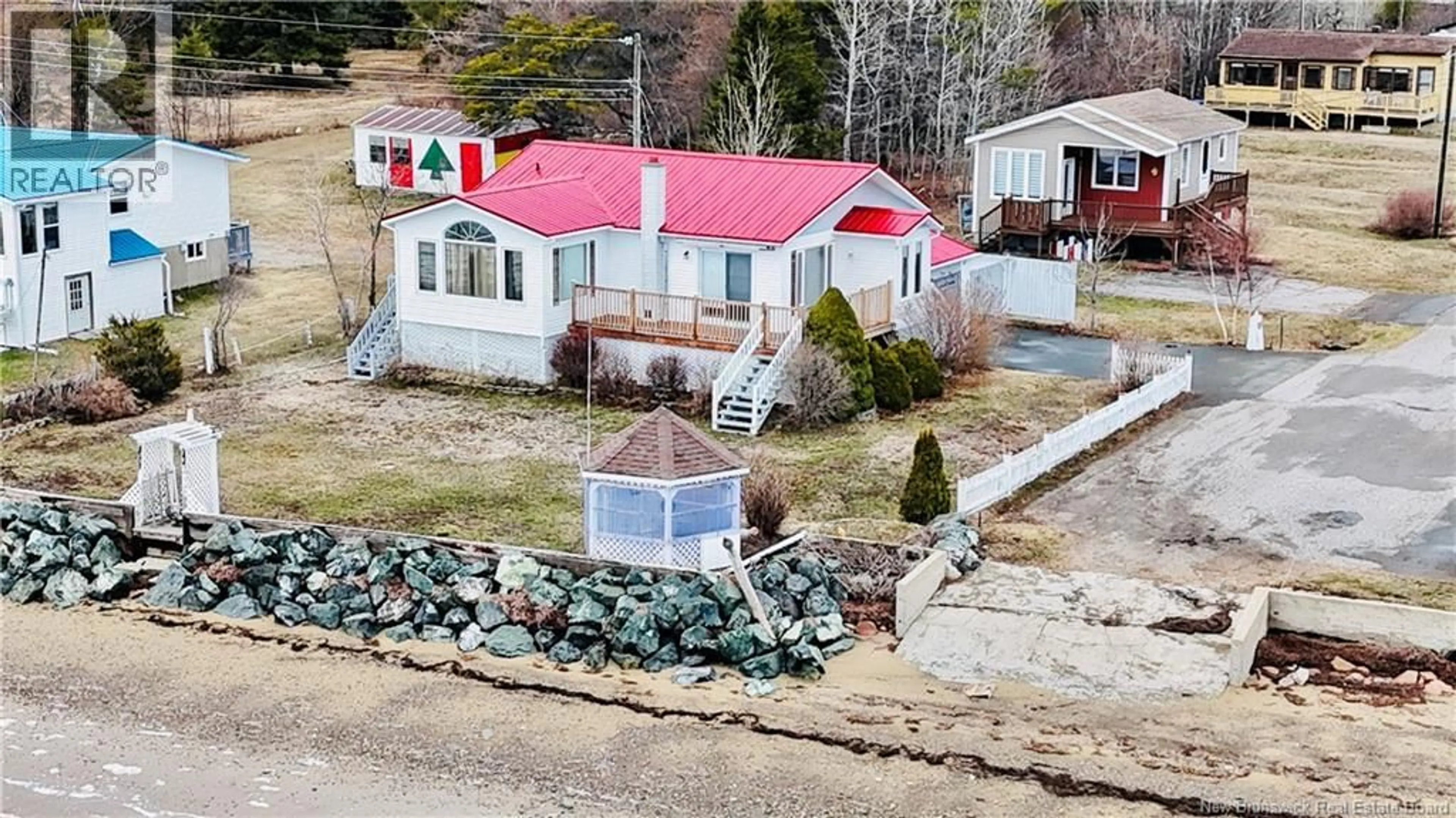 A pic from outside/outdoor area/front of a property/back of a property/a pic from drone, water/lake/river/ocean view for 52 BLANCHARD STREET, Maisonnette New Brunswick E8N1W1