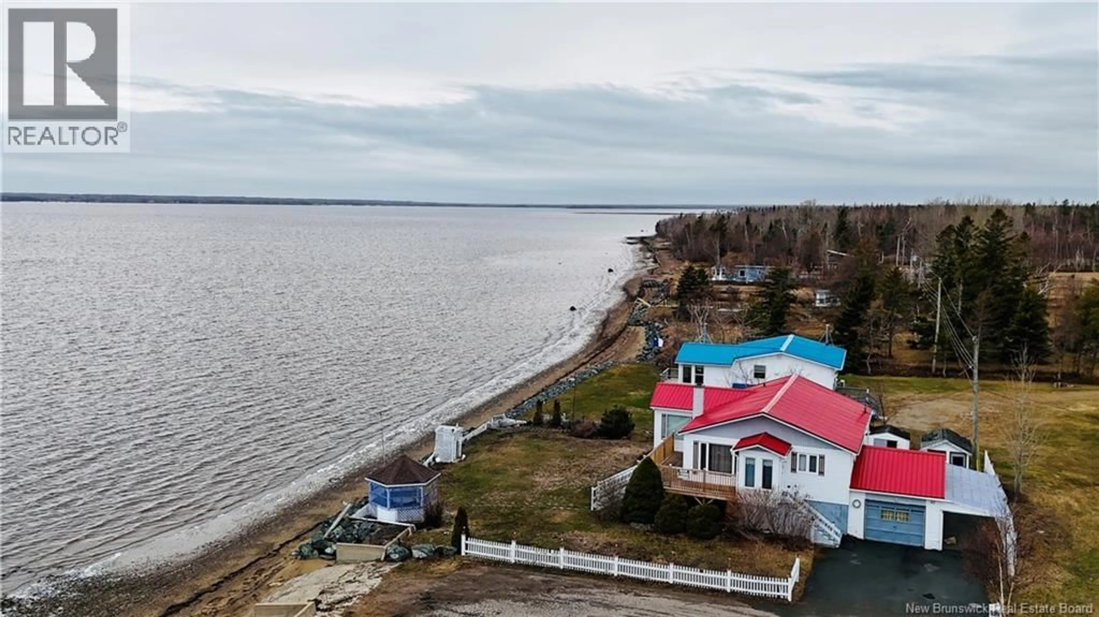 A pic from outside/outdoor area/front of a property/back of a property/a pic from drone, water/lake/river/ocean view for 52 BLANCHARD STREET, Maisonnette New Brunswick E8N1W1