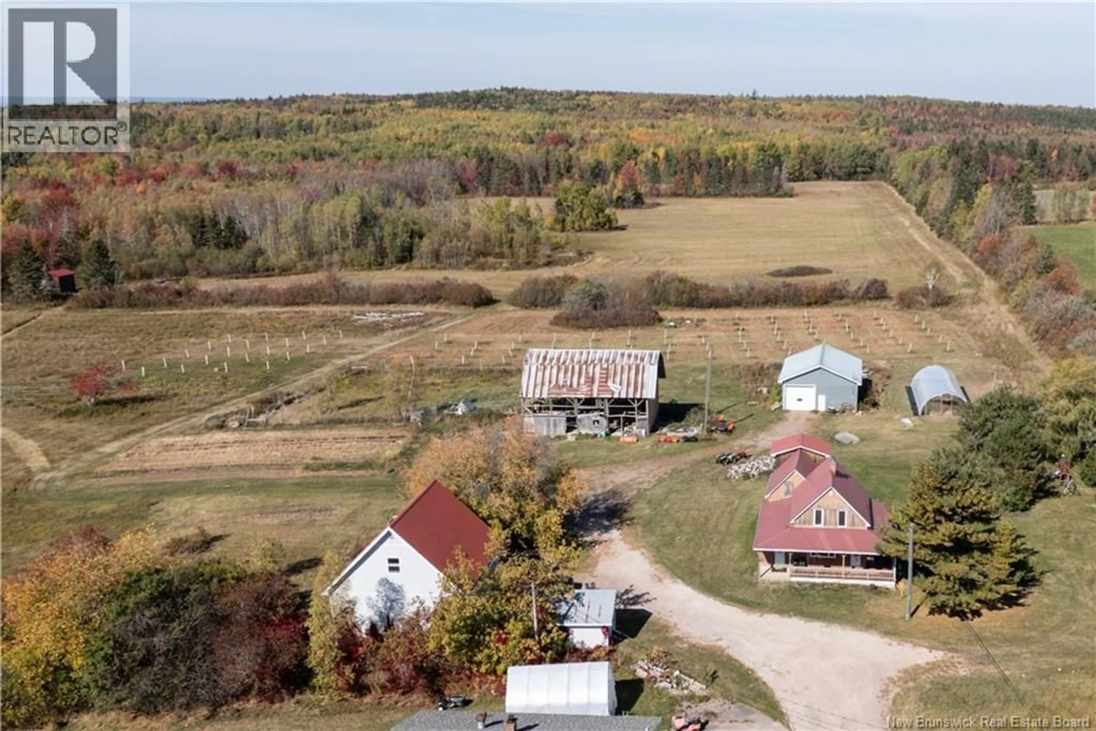 A pic from outside/outdoor area/front of a property/back of a property/a pic from drone, unknown for 21 JOSEPH LANE, Lewis Mountain New Brunswick E4J3N1