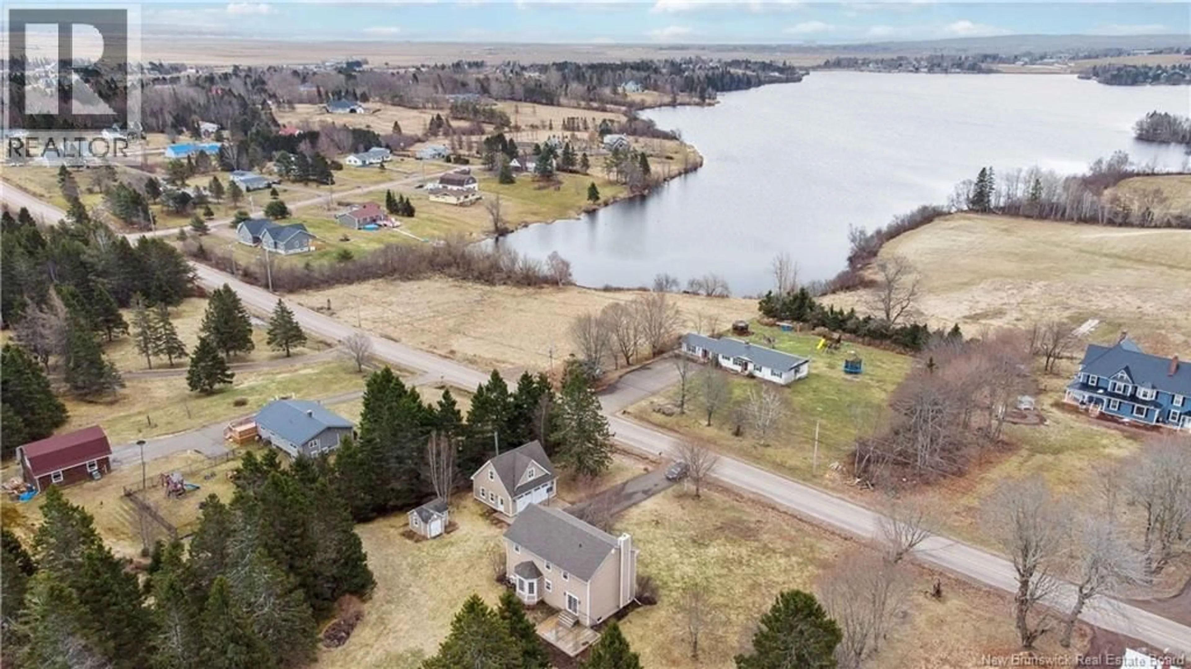 A pic from outside/outdoor area/front of a property/back of a property/a pic from drone, water/lake/river/ocean view for 69 MOUNT VIEW, Sackville New Brunswick E4L1M3