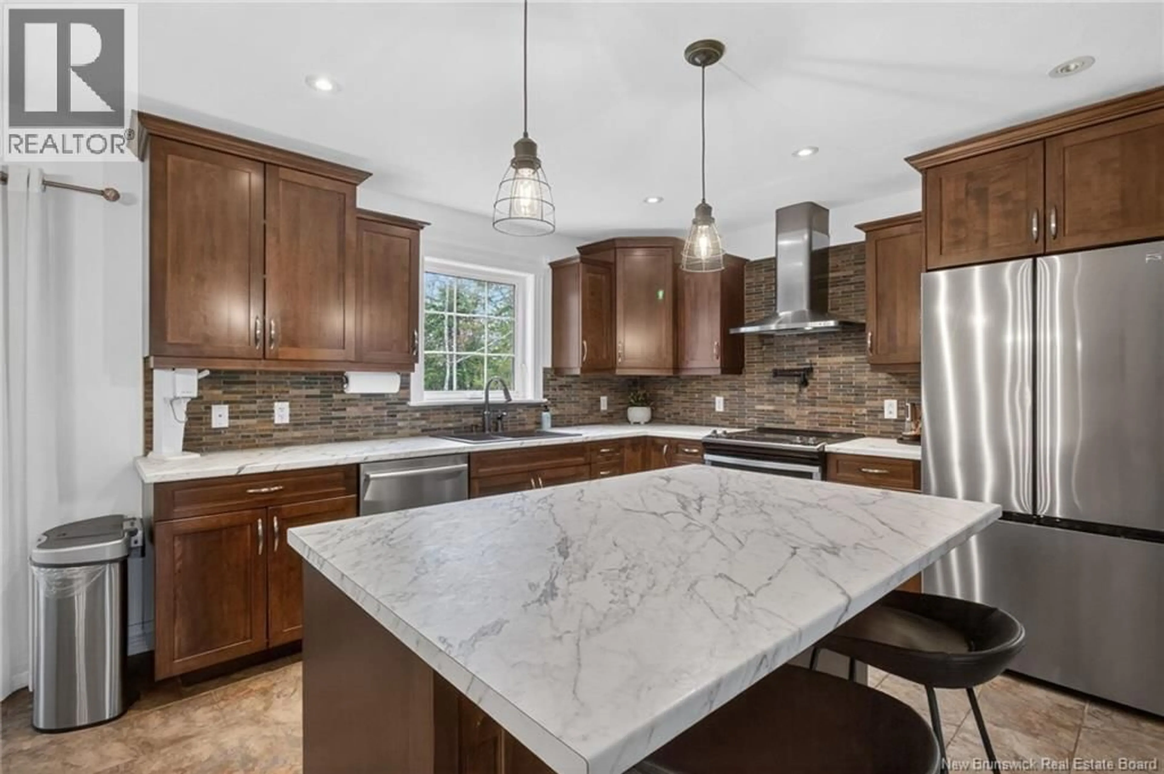 Open concept kitchen, ceramic/tile floor for 23 BRIAN DRIVE, Saint-Antoine New Brunswick E4V3L6