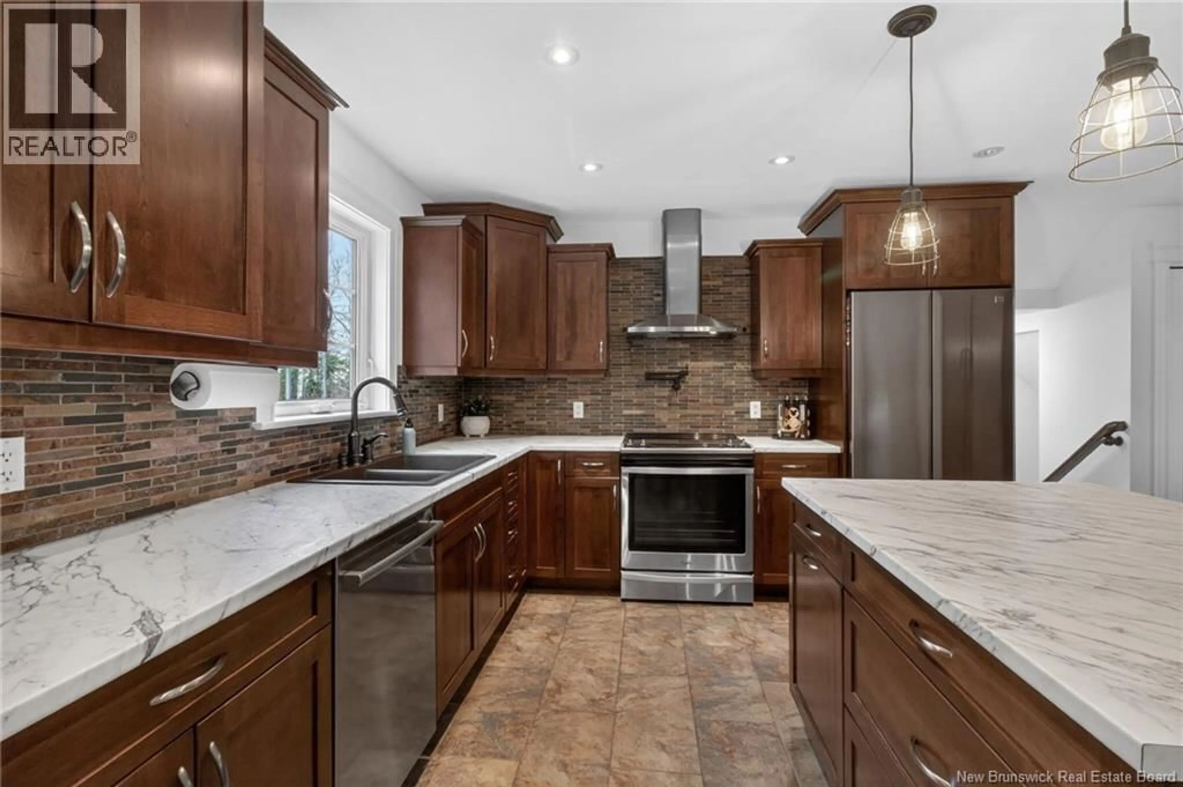 Open concept kitchen, ceramic/tile floor for 23 BRIAN DRIVE, Saint-Antoine New Brunswick E4V3L6