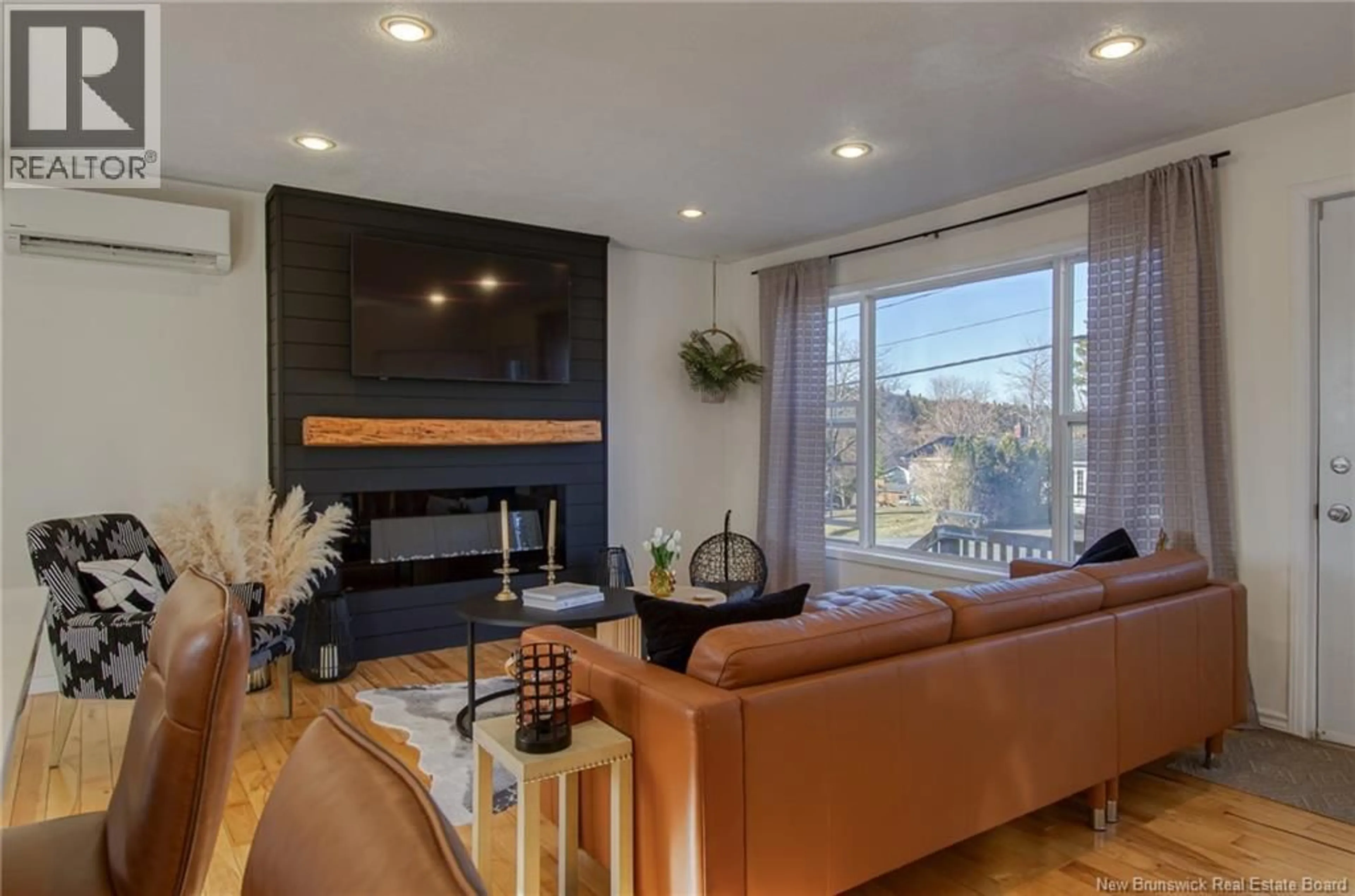 Living room with furniture, wood/laminate floor for 195 SUMMIT DRIVE, Saint John New Brunswick E2J3M1