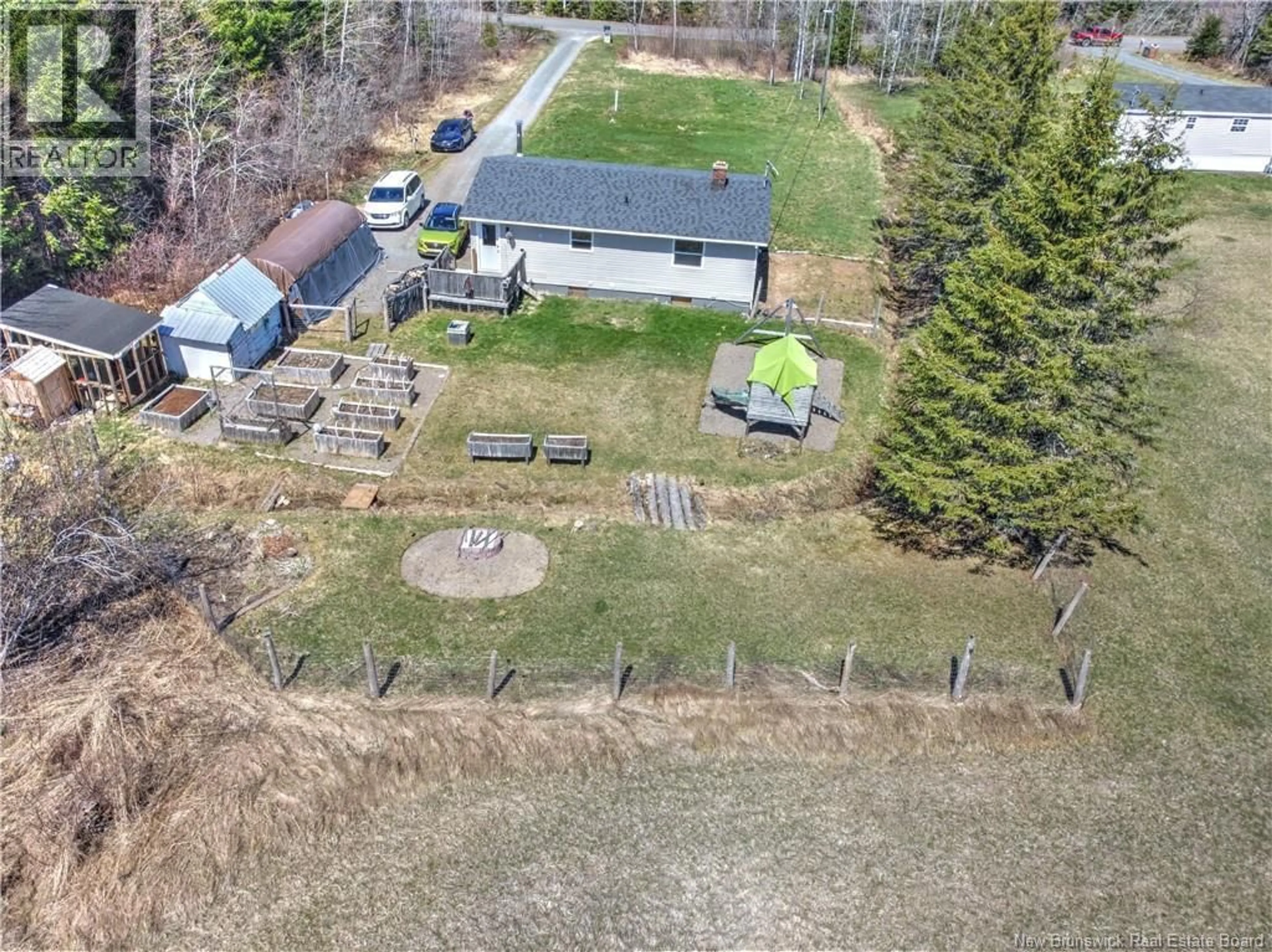 A pic from outside/outdoor area/front of a property/back of a property/a pic from drone, water/lake/river/ocean view for 161 RIVERSIDE DRIVE, Fredericton Junction New Brunswick E5L1V6