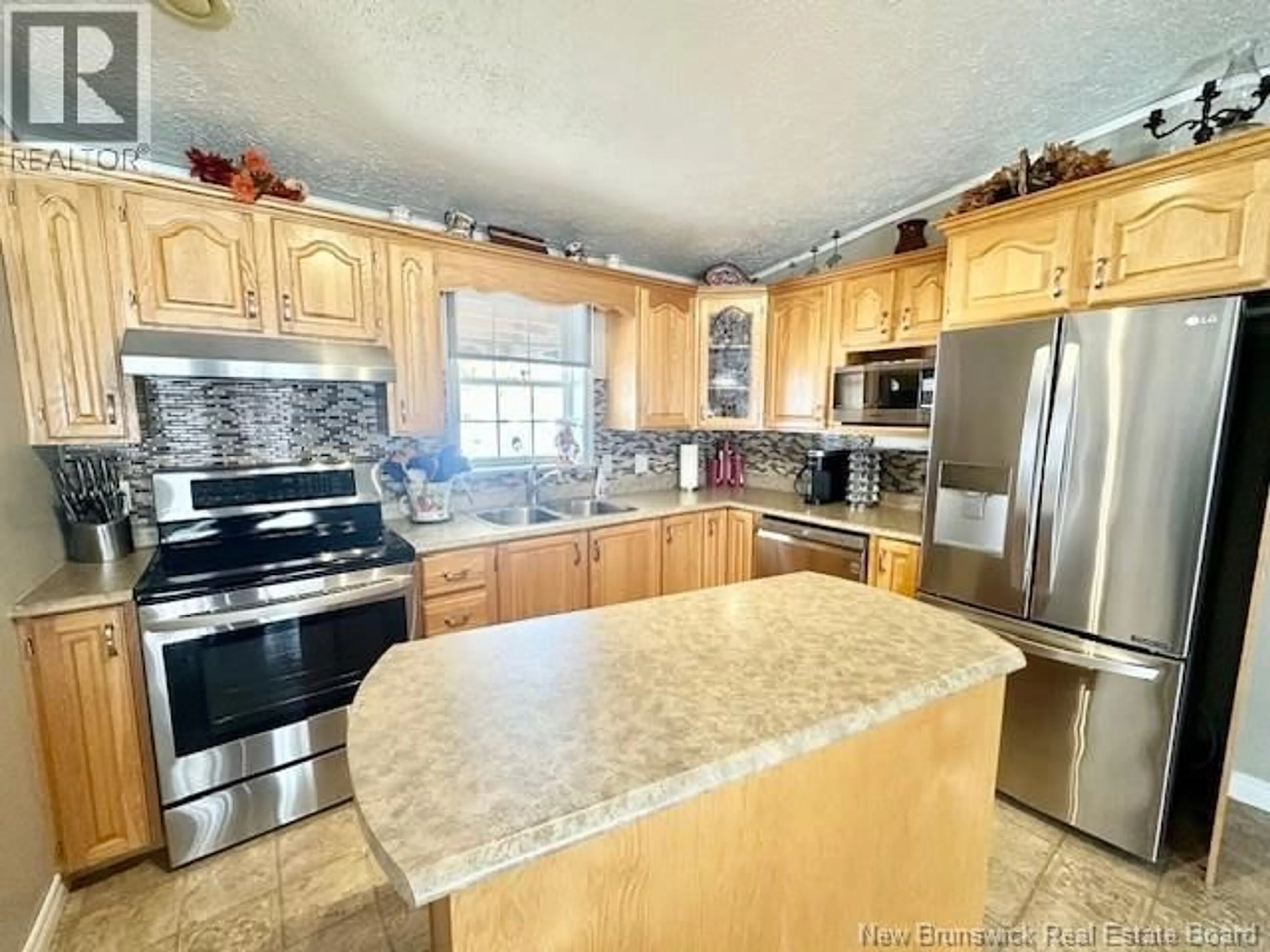 Open concept kitchen, unknown for 61 MAPLE GREEN CRESCENT, Dalhousie Junction New Brunswick E3N5Z2