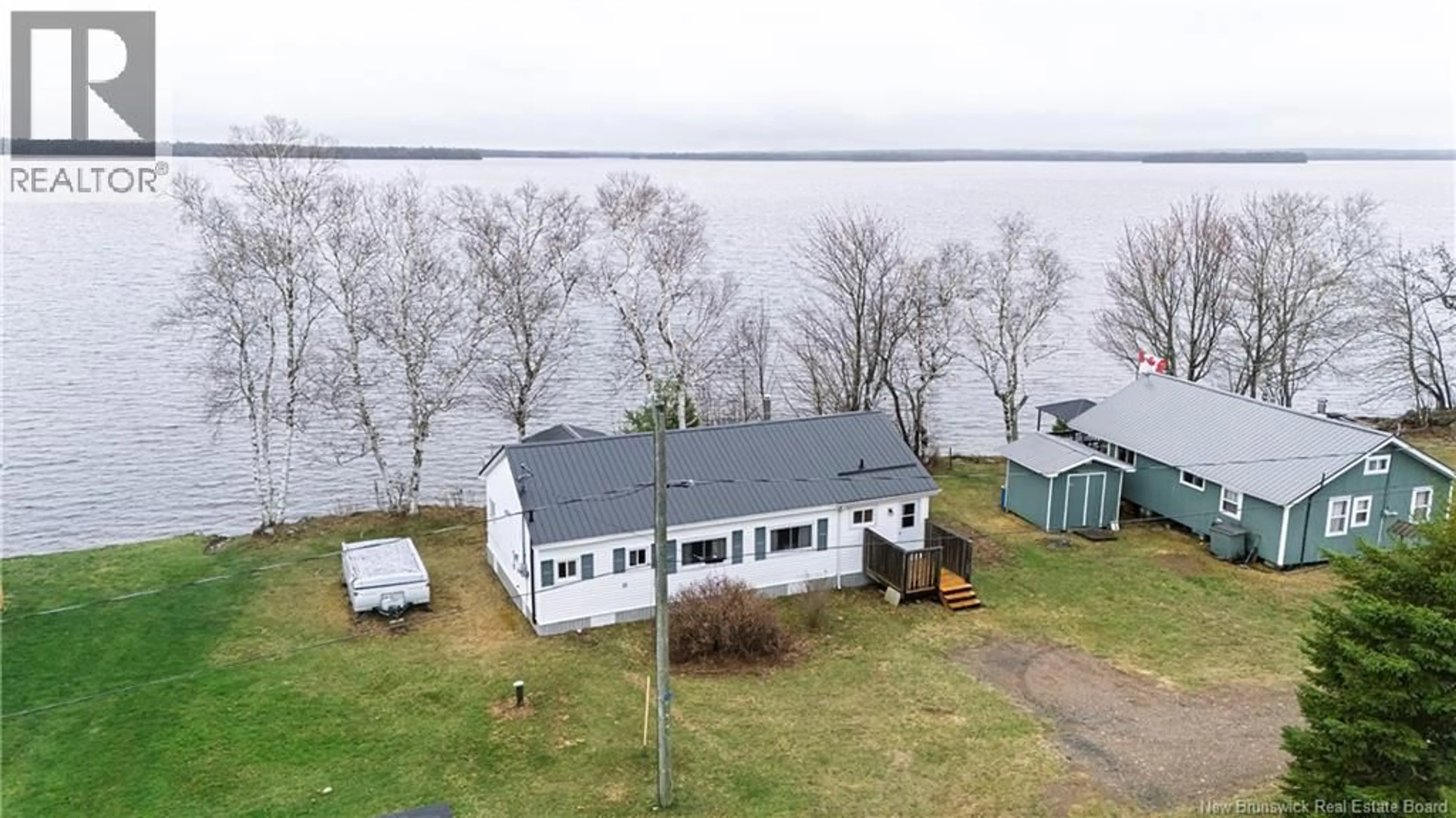 A pic from outside/outdoor area/front of a property/back of a property/a pic from drone, water/lake/river/ocean view for 40 WARRENS LANE, Harvey New Brunswick E6K2L4