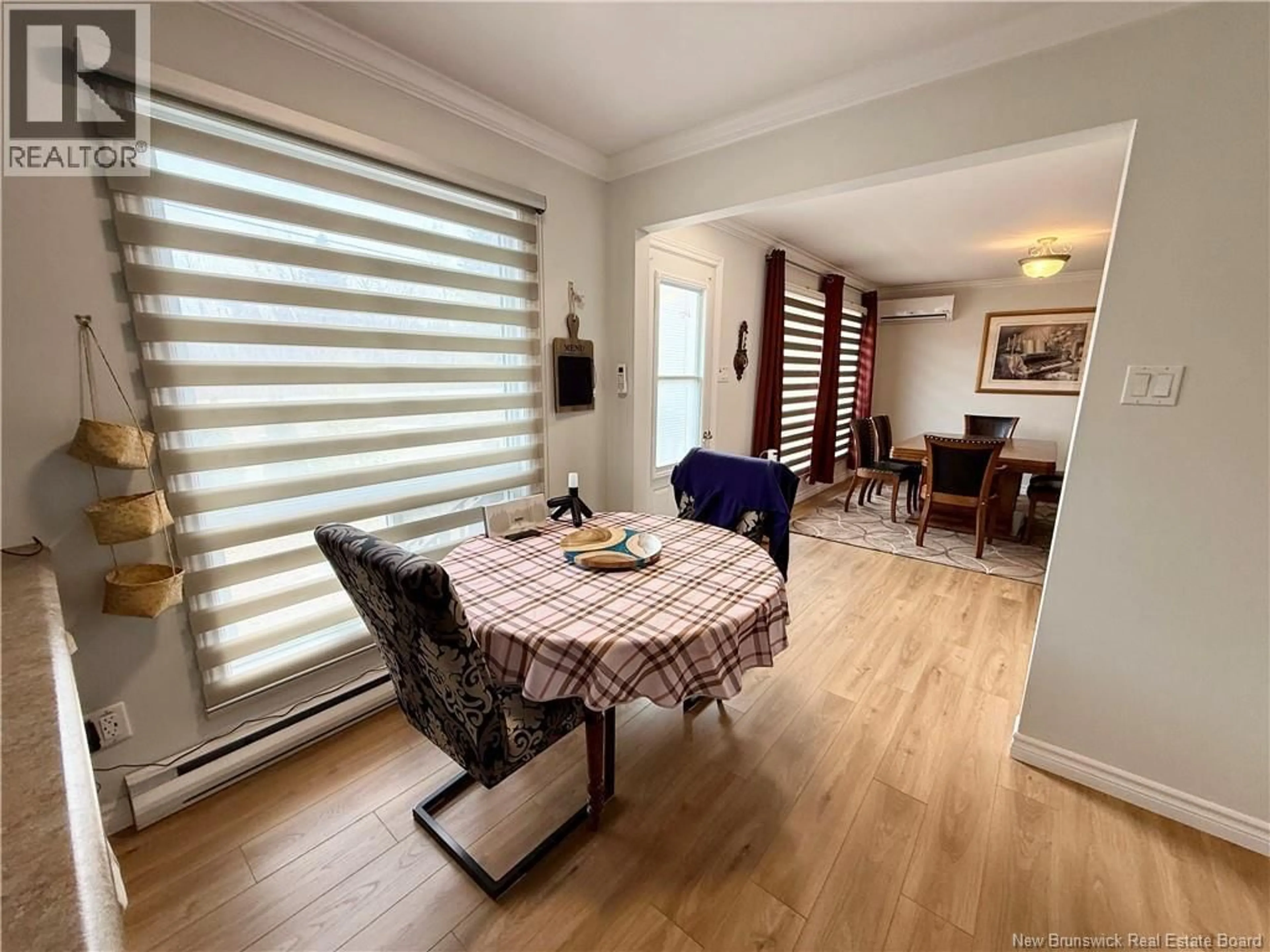 Dining room, wood/laminate floor for 2002 NICHOLAS DENYS, Sainte-Rosette New Brunswick E8K3H9