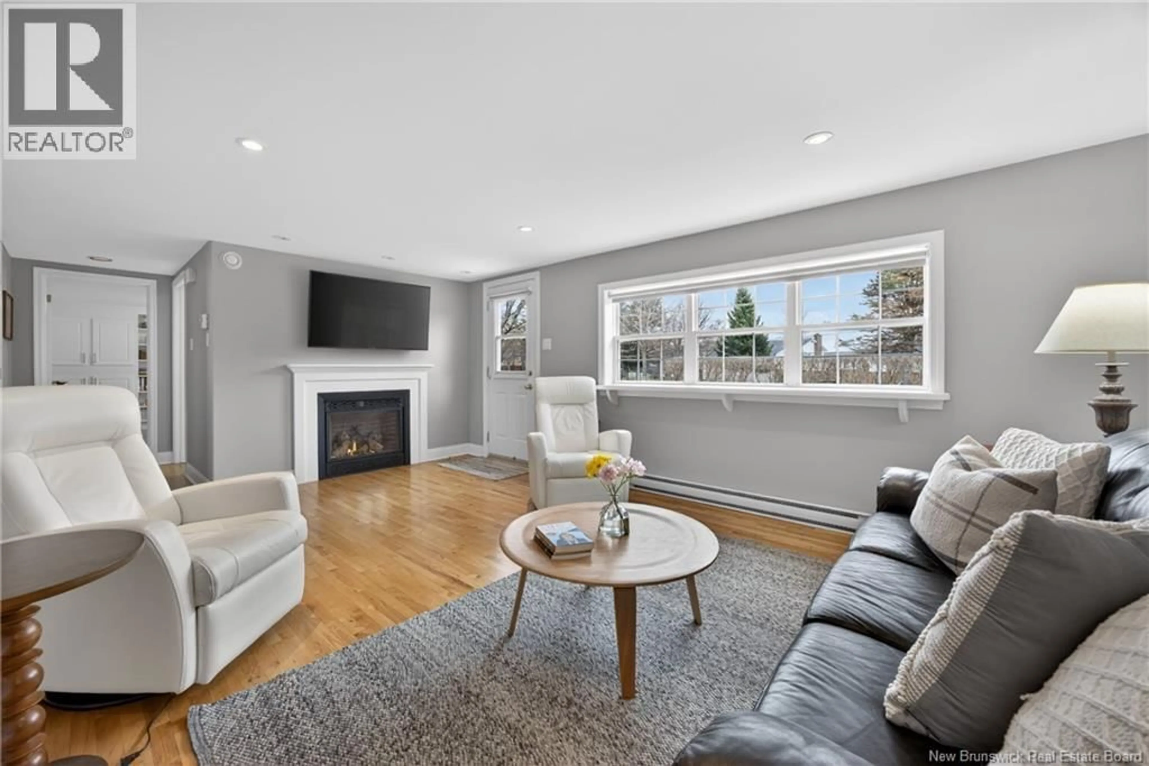 Living room with furniture, unknown for 55 LAWSON COURT, Fredericton New Brunswick E3A5G3