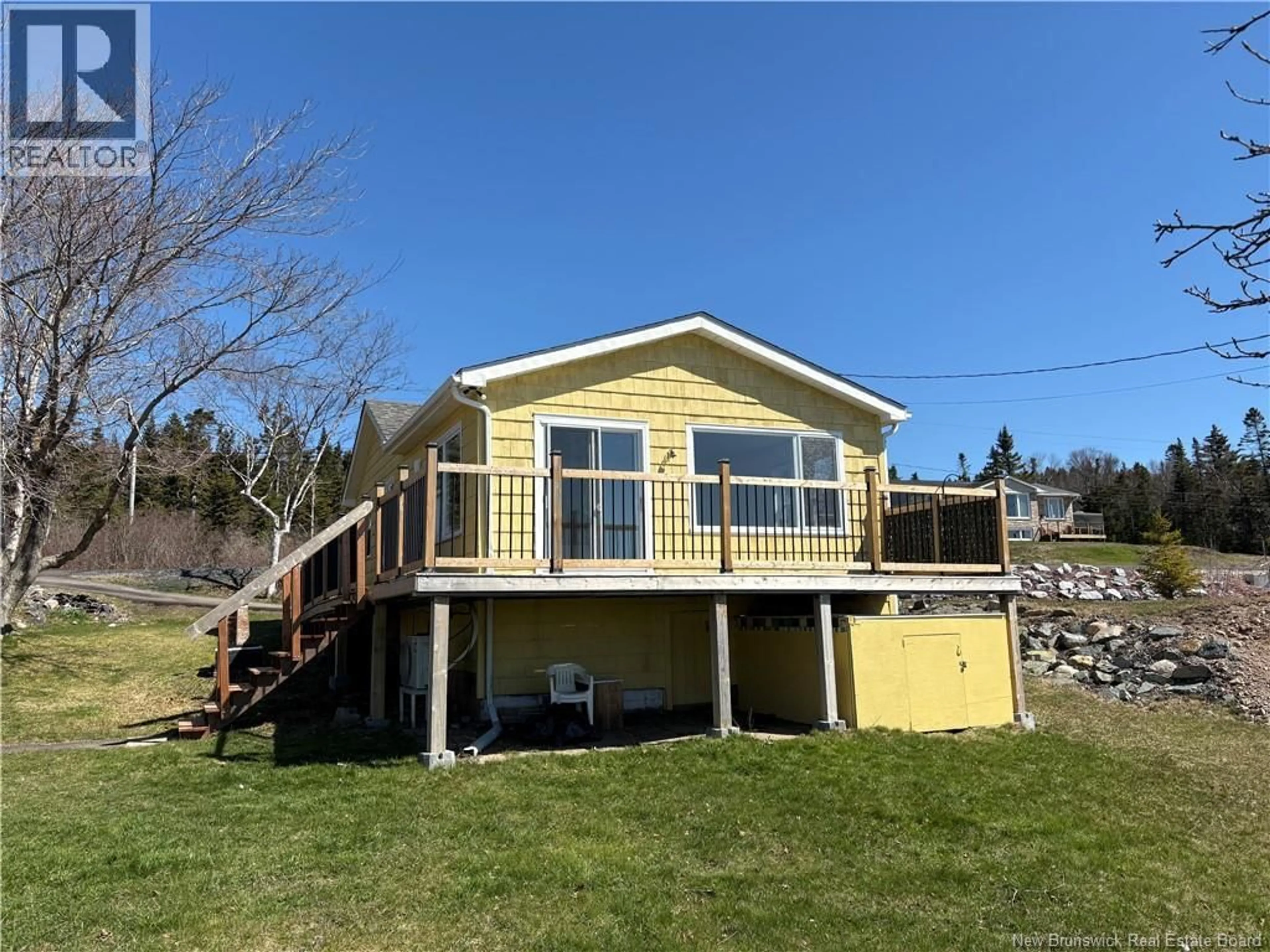 A pic from outside/outdoor area/front of a property/back of a property/a pic from drone, water/lake/river/ocean view for 1512 ROUTE 790, Dipper Harbour New Brunswick E5J1Y2