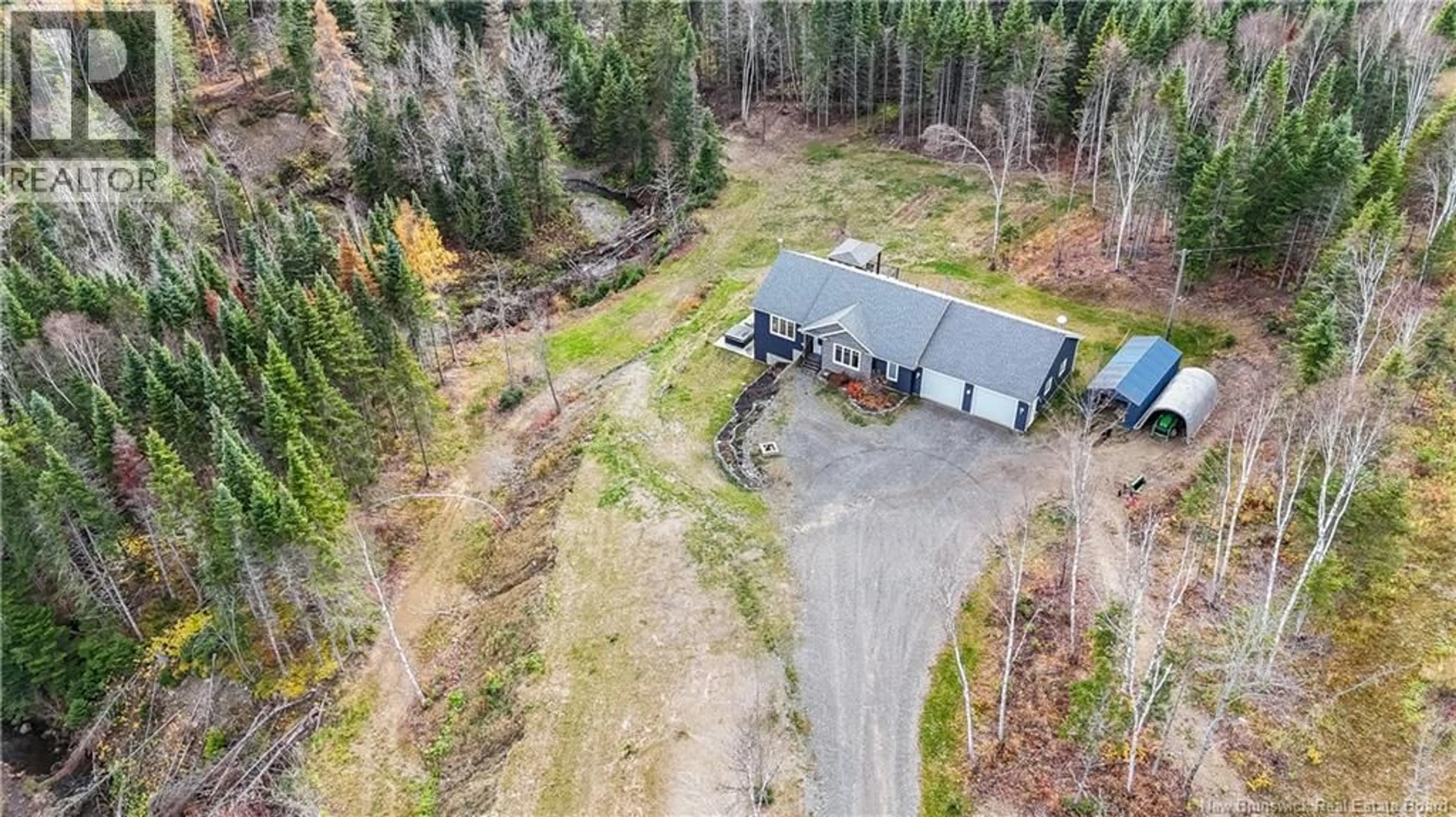A pic from outside/outdoor area/front of a property/back of a property/a pic from drone, unknown for 38 BOUTOT LANE, DSL de Grand-Sault/Falls New Brunswick E3Z0C6