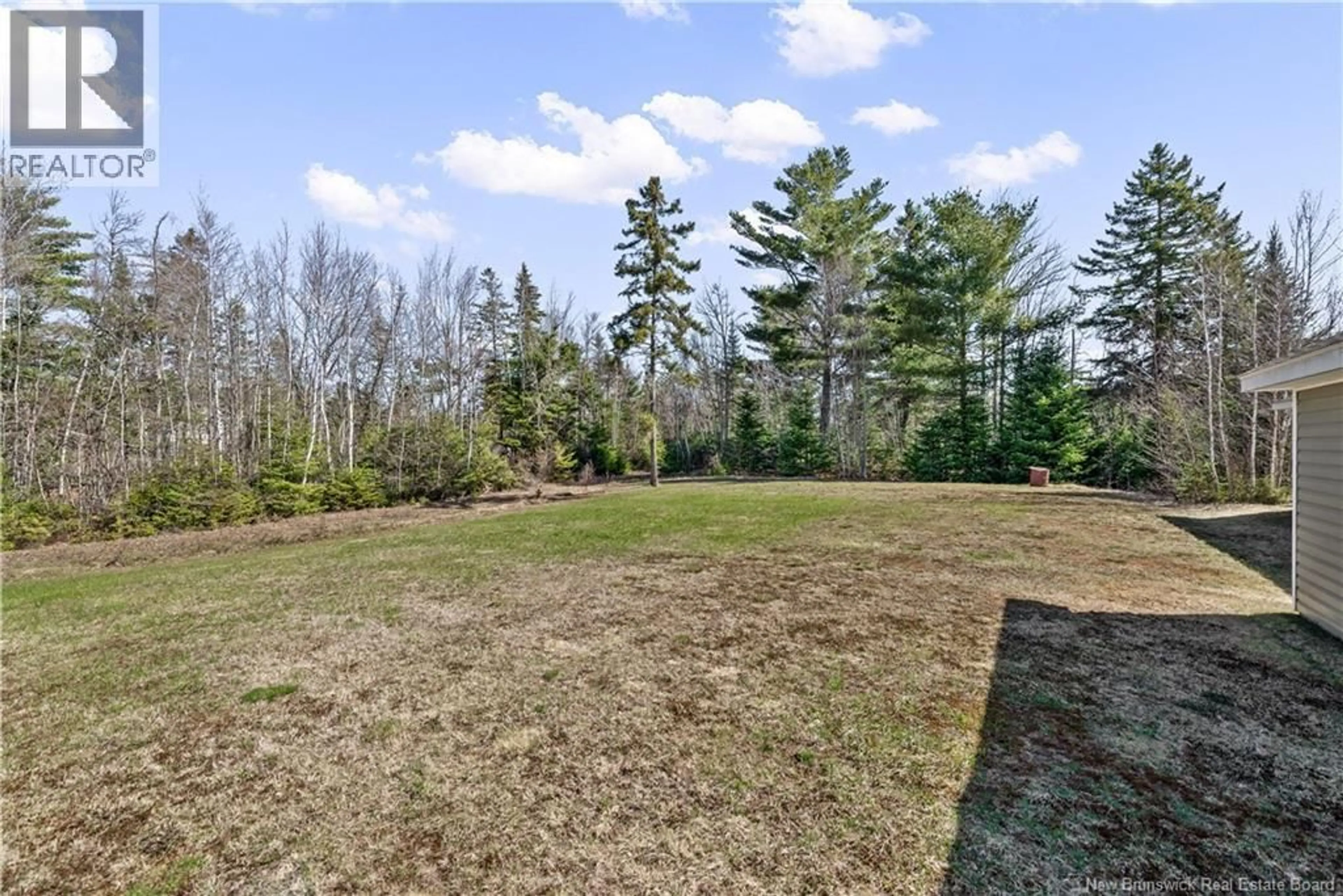A pic from outside/outdoor area/front of a property/back of a property/a pic from drone, forest/trees view for 401 CH SAINT-ANDRE ROAD, Cap-Pelé New Brunswick E4N1Z5