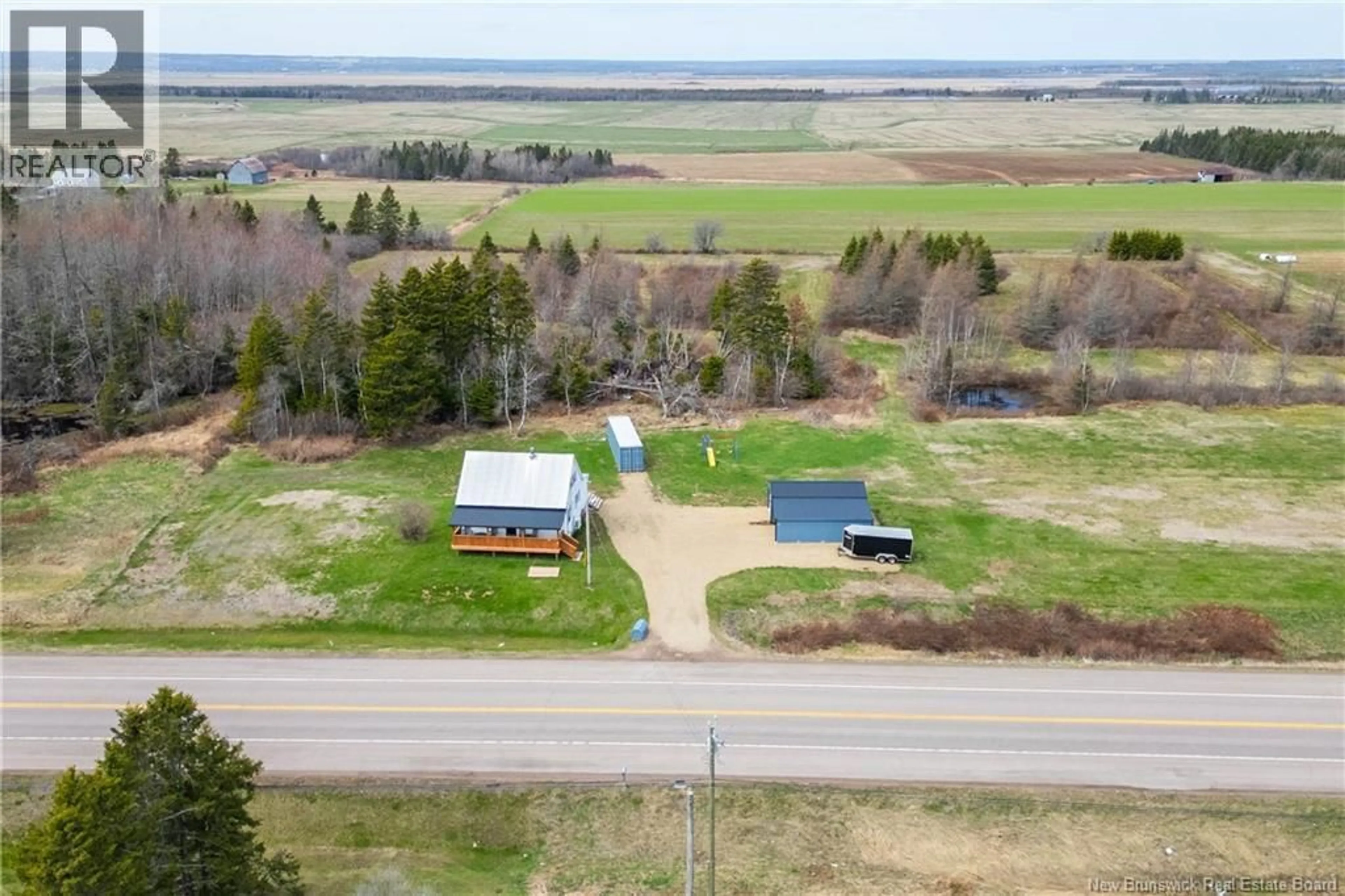 A pic from outside/outdoor area/front of a property/back of a property/a pic from drone, unknown for 632 ROUTE 16, Pointe de Bute New Brunswick E4L2N5