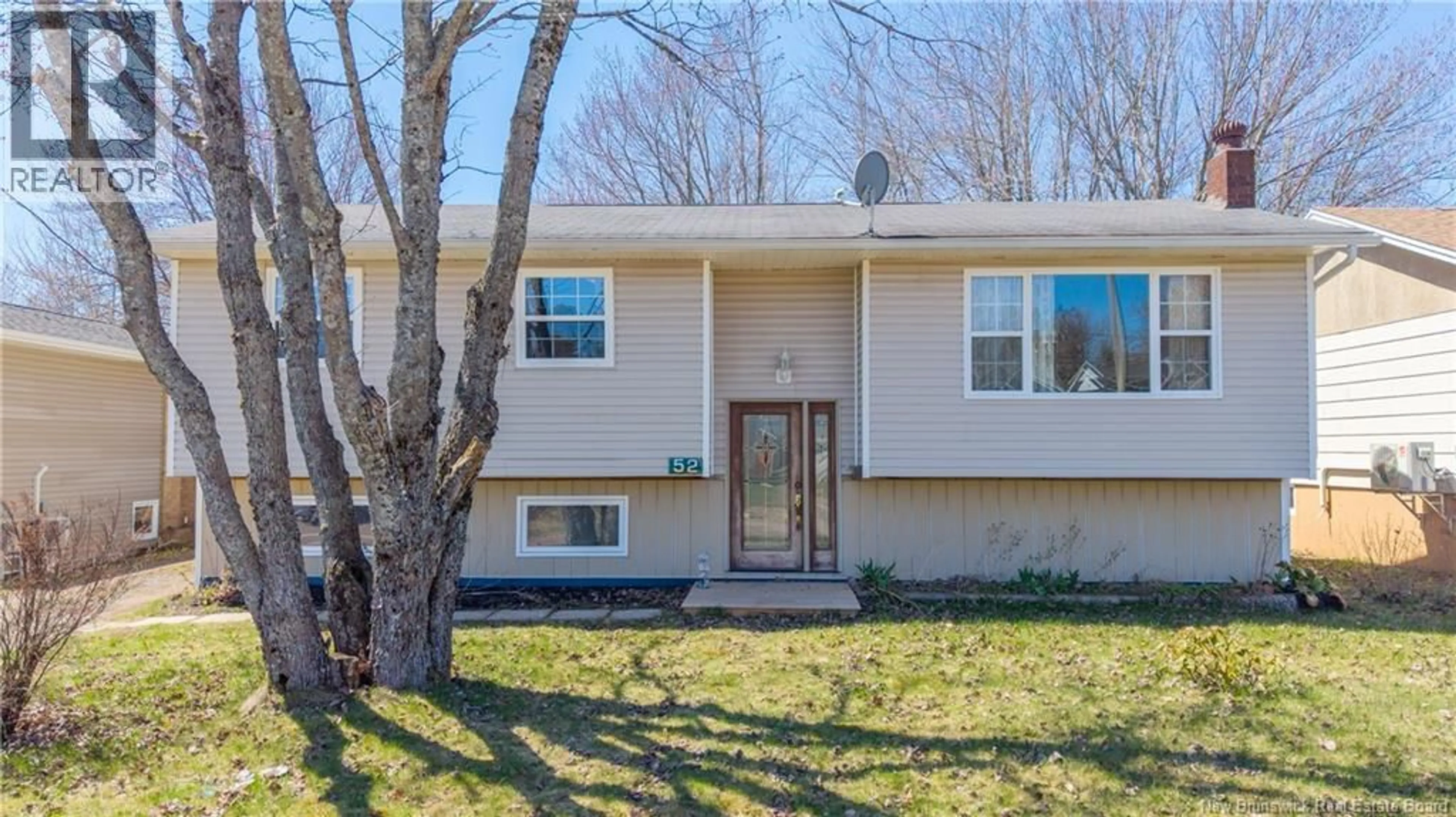 Home with vinyl exterior material, street for 52 DEEPWOOD STREET, Moncton New Brunswick E1A4Z3