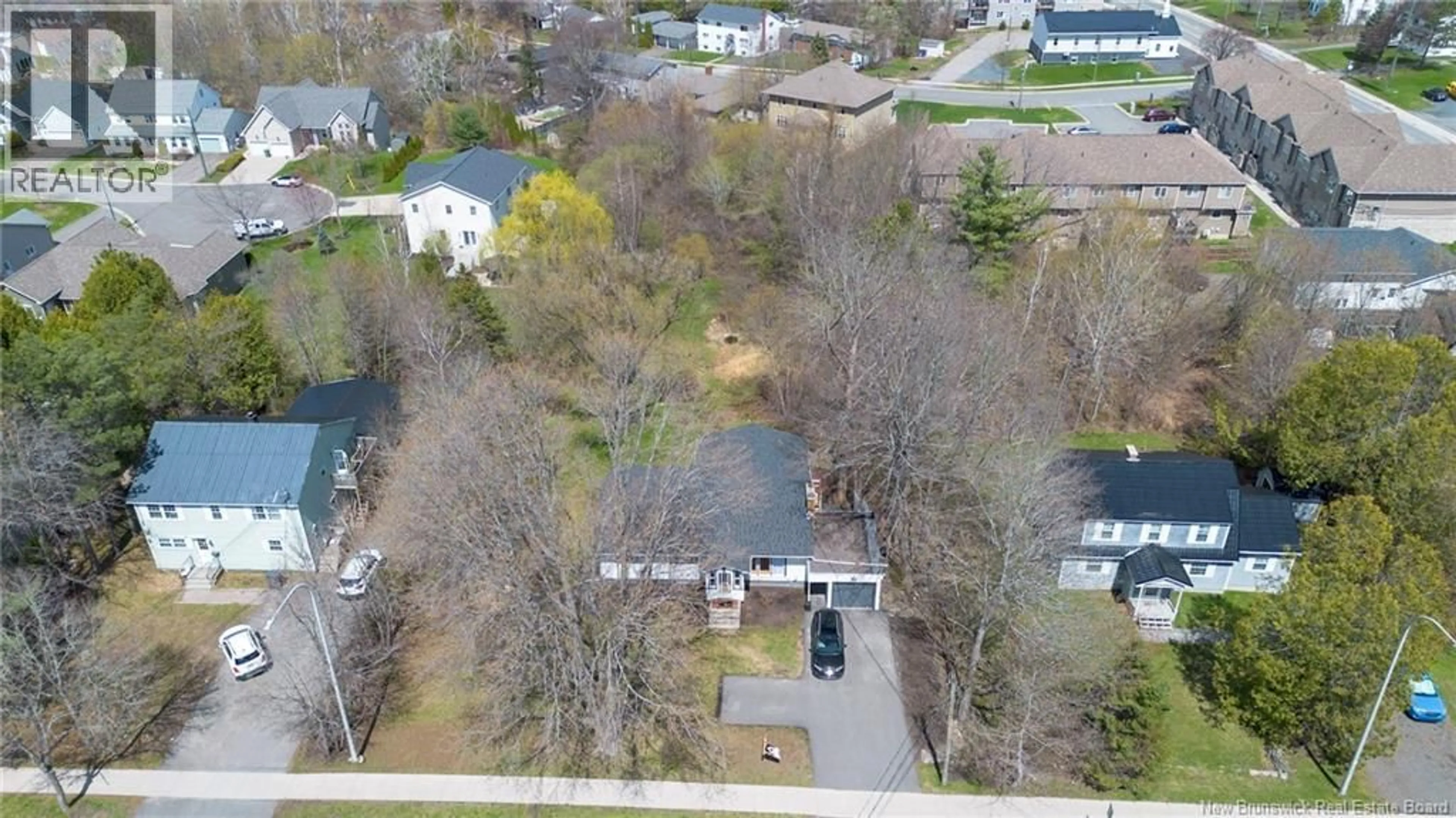 A pic from outside/outdoor area/front of a property/back of a property/a pic from drone, street for 559 MONTGOMERY STREET, Fredericton New Brunswick E3B2X6