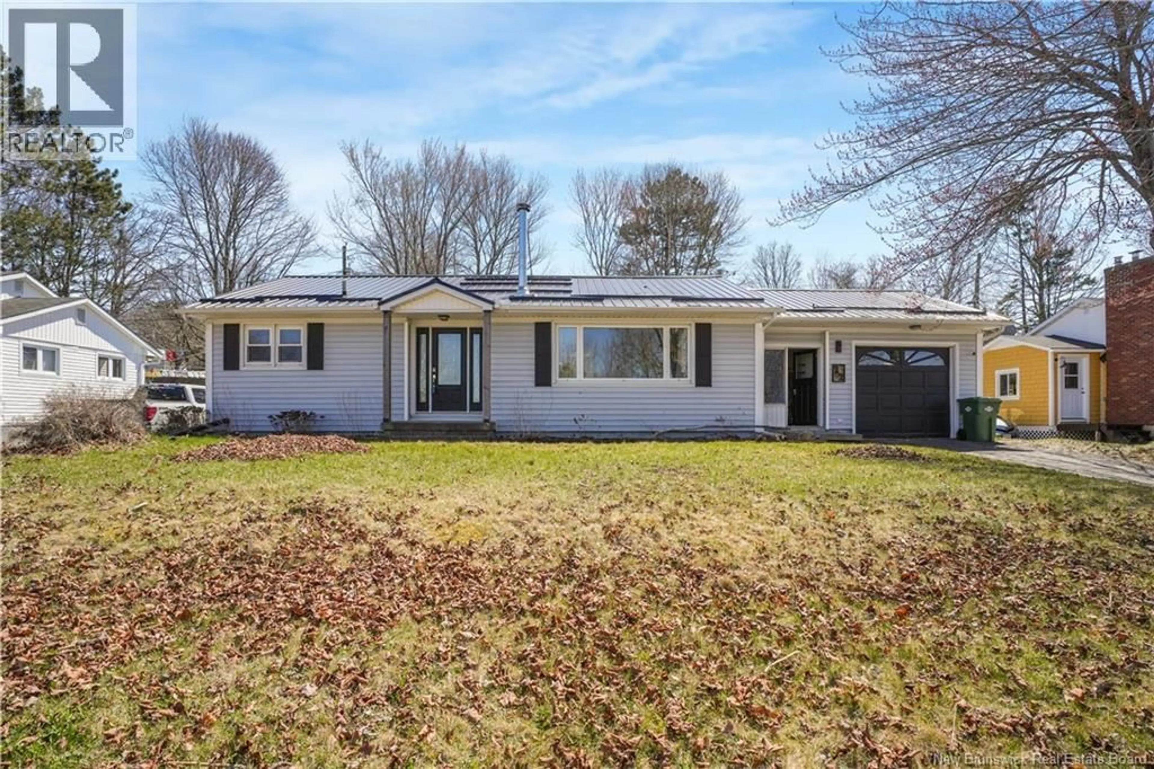 Home with vinyl exterior material, street for 22 BIRCHCROFT DRIVE, Fredericton New Brunswick E3C1K7